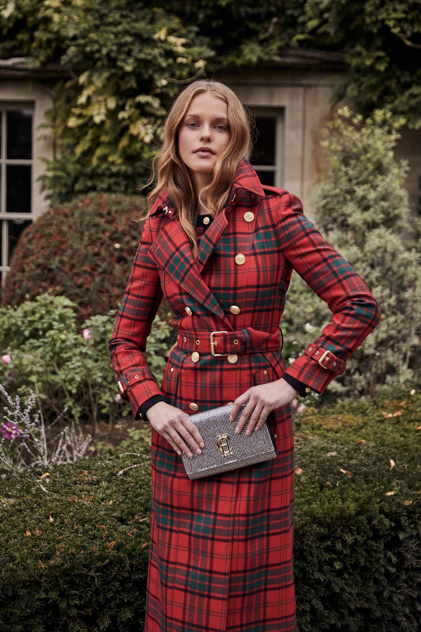 womens red tartan trench coat with crystal embellished clutch bag