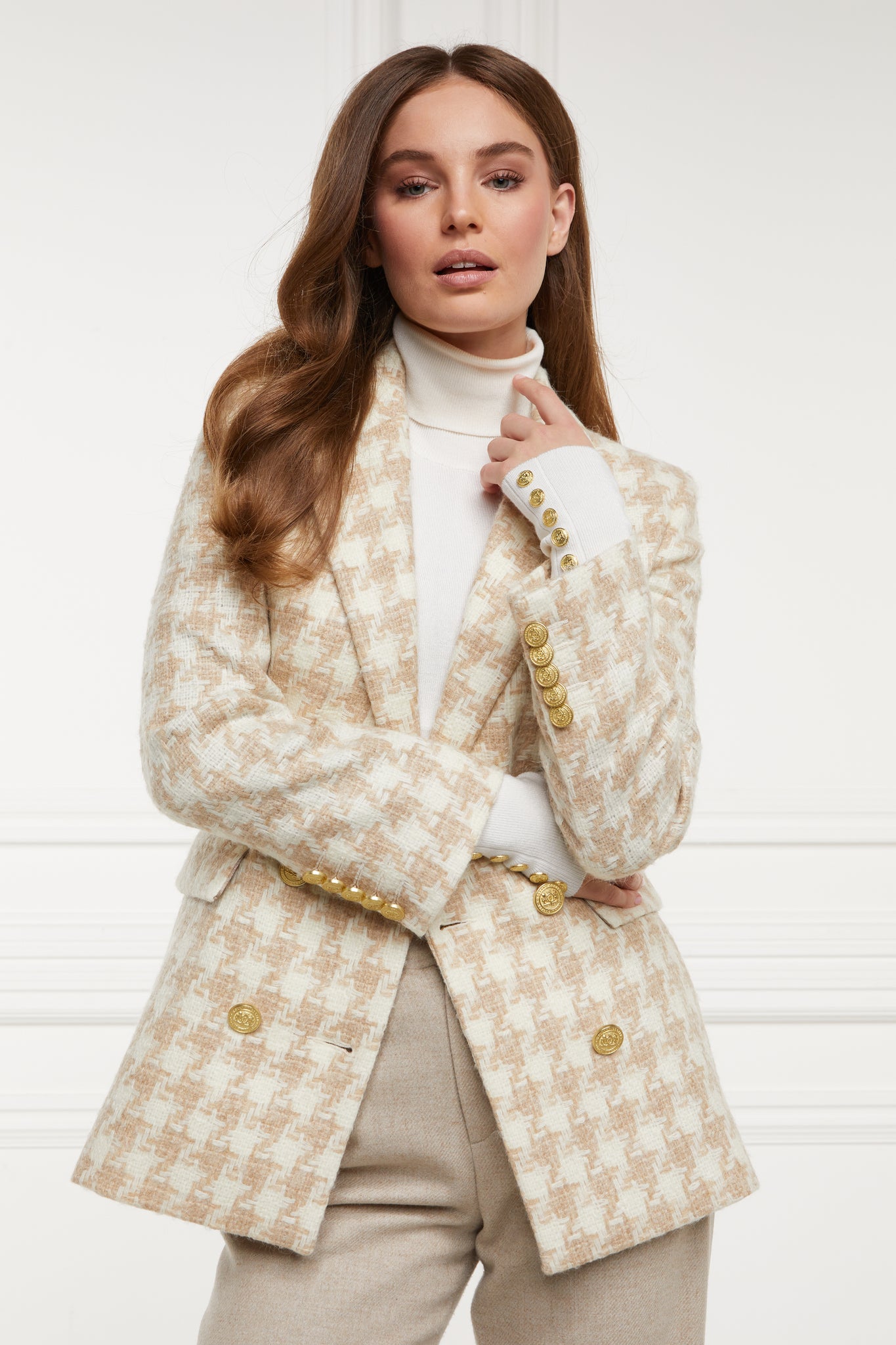 double breasted wool blazer in white and camel houndstooth with two hip pockets and gold button details down front and on cuffs and handmade in the uk