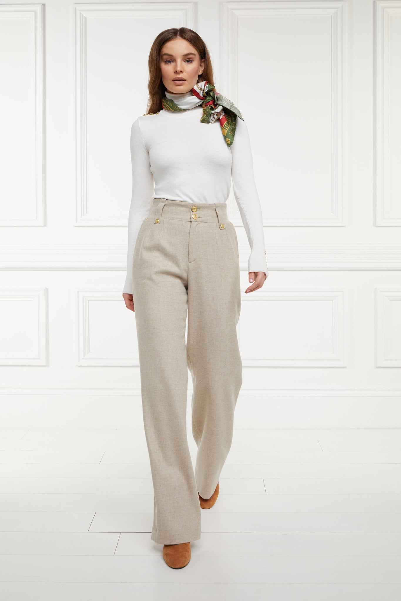 Women's oatmeal wool high waisted straight trouser with white roll neck top and silk scarf around the neck 