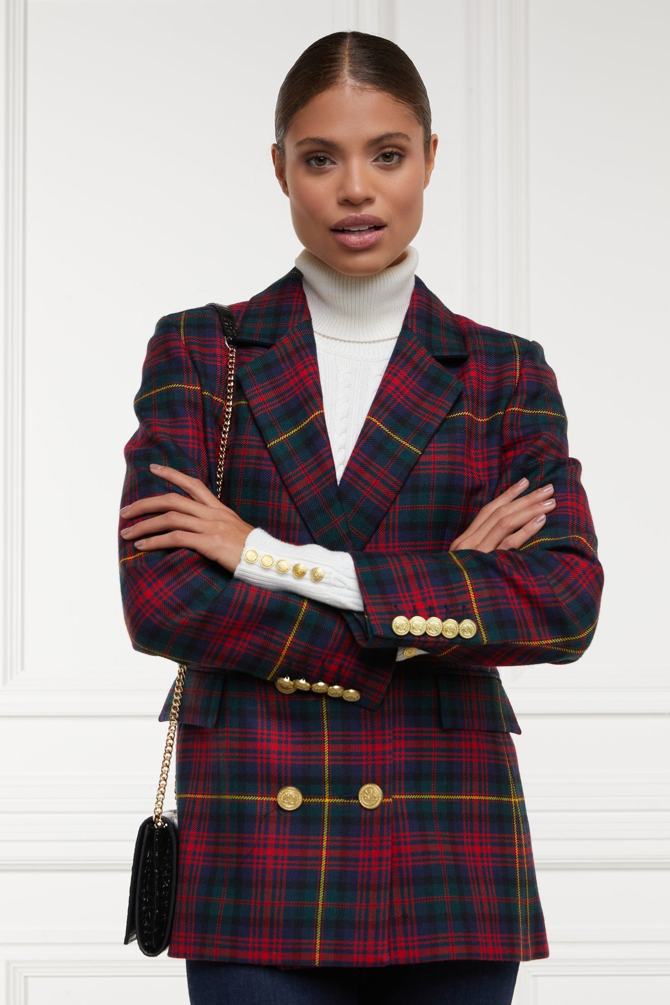 double breasted wool blazer in dark red navy green and yellow logan tartan with two hip pockets and gold button details down front and on cuffs and handmade in the uk