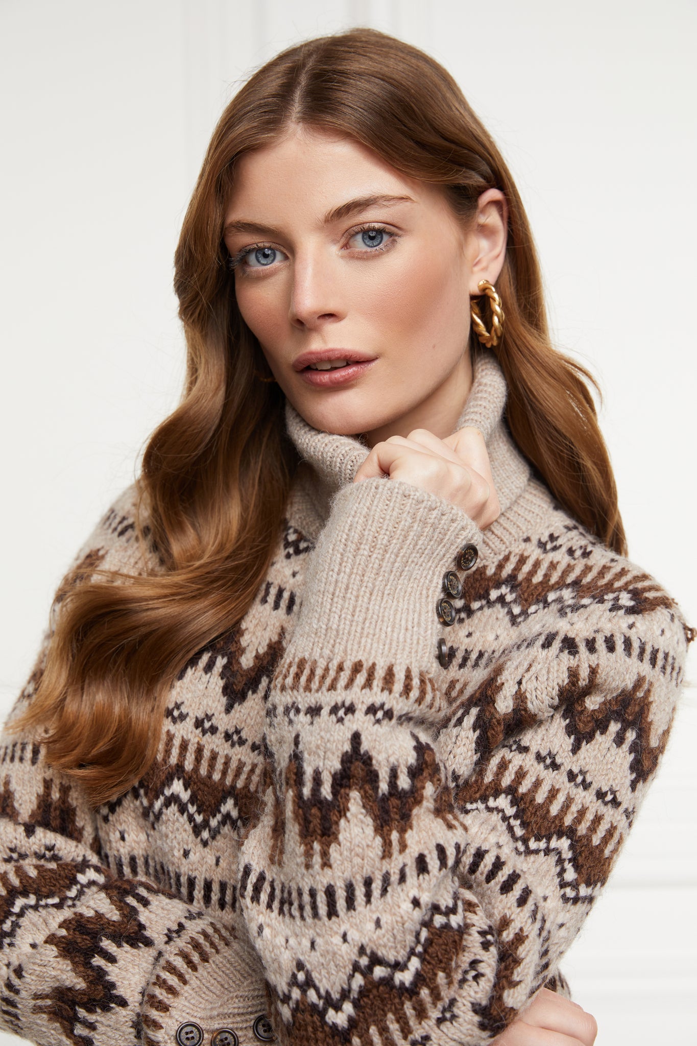 high roll neck knit jumper in taupe with a brown fairisle pattern and ribbed cuffs hem and neckline