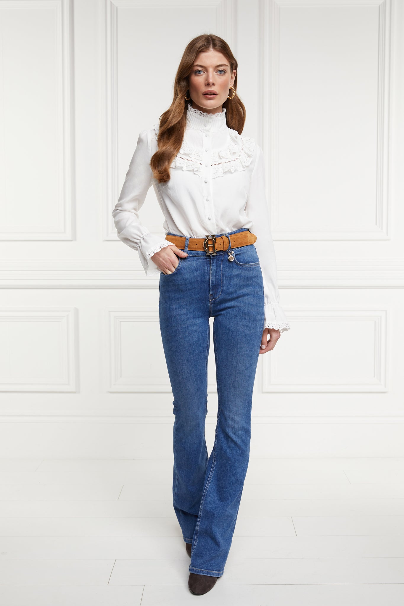 White blouse with long sleeves and a slim fit with delicate lace trim to both the collar and cuff edges with flattering lace details to the front body