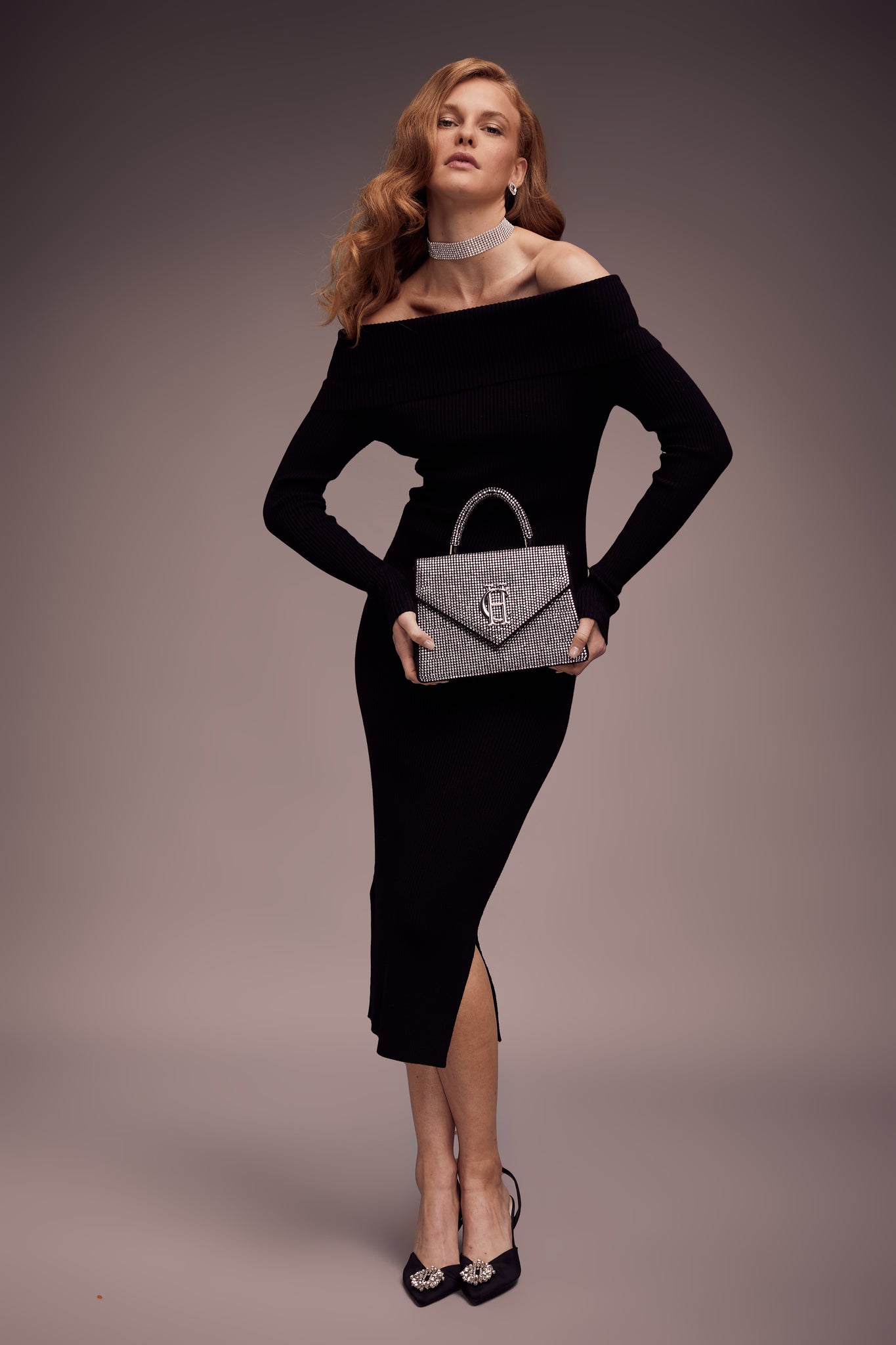 womens black long sleeved ribbed knitted bardot midi dress with gold buttons on cuffs and silver diamantes rhinestones clutch bag