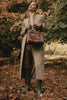 video of green and pink check tweed womens single breasted wool coat with brown and light brown check peg trousers with dark brown womens small dark brown croc embossed leather tote bag