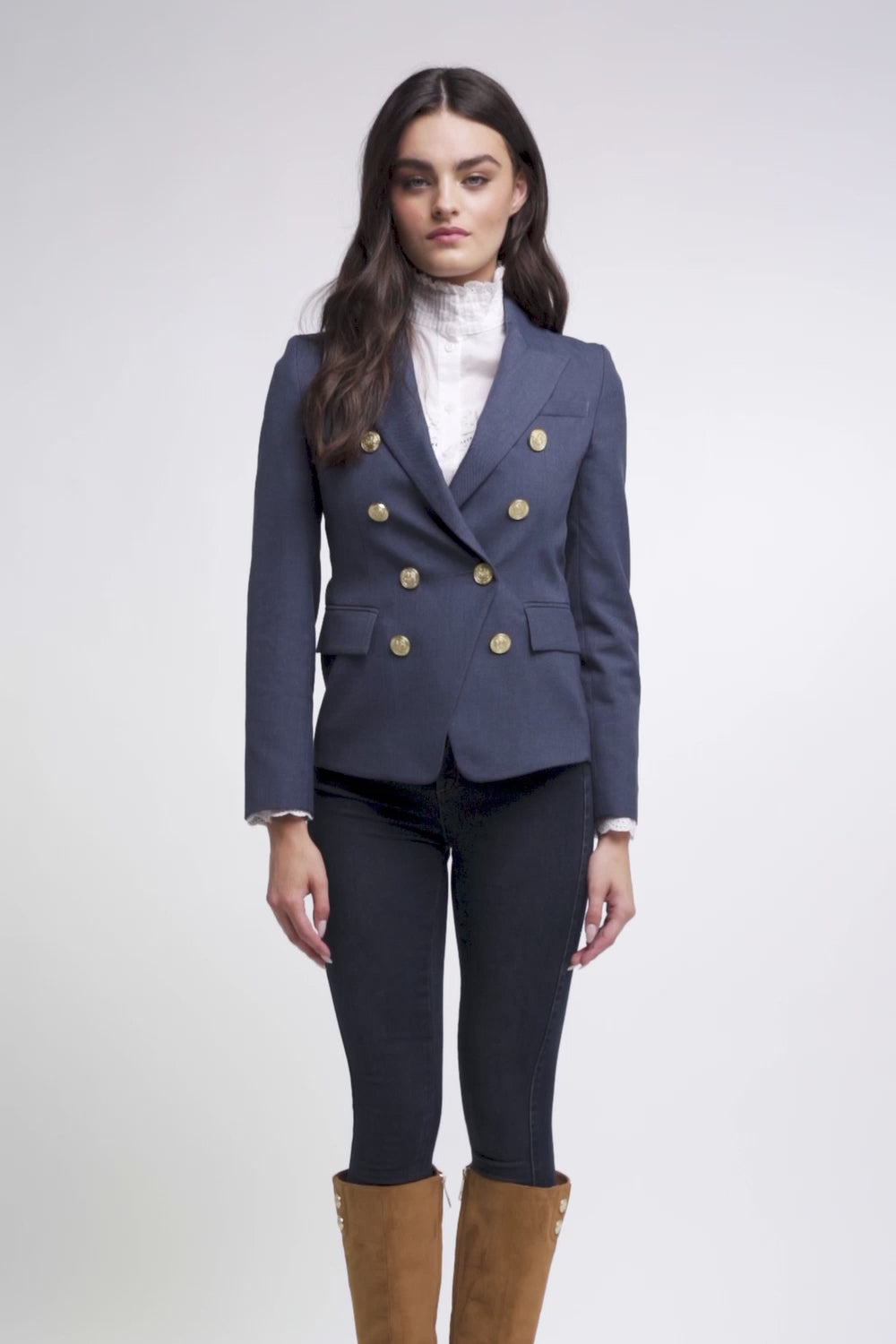 British made double breasted blazer that fastens with a single button hole to create a more form fitting silhouette with two pockets and gold button detailing this blazer in denim