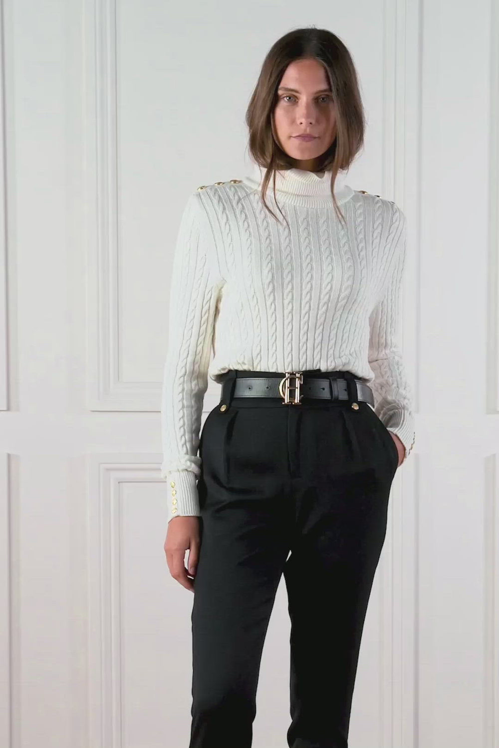 womens cable knit jumper in white with ribbed roll neck cuffs and hem