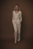 Women’s ivory wool high waisted straight trousers with wool v neck knitted top