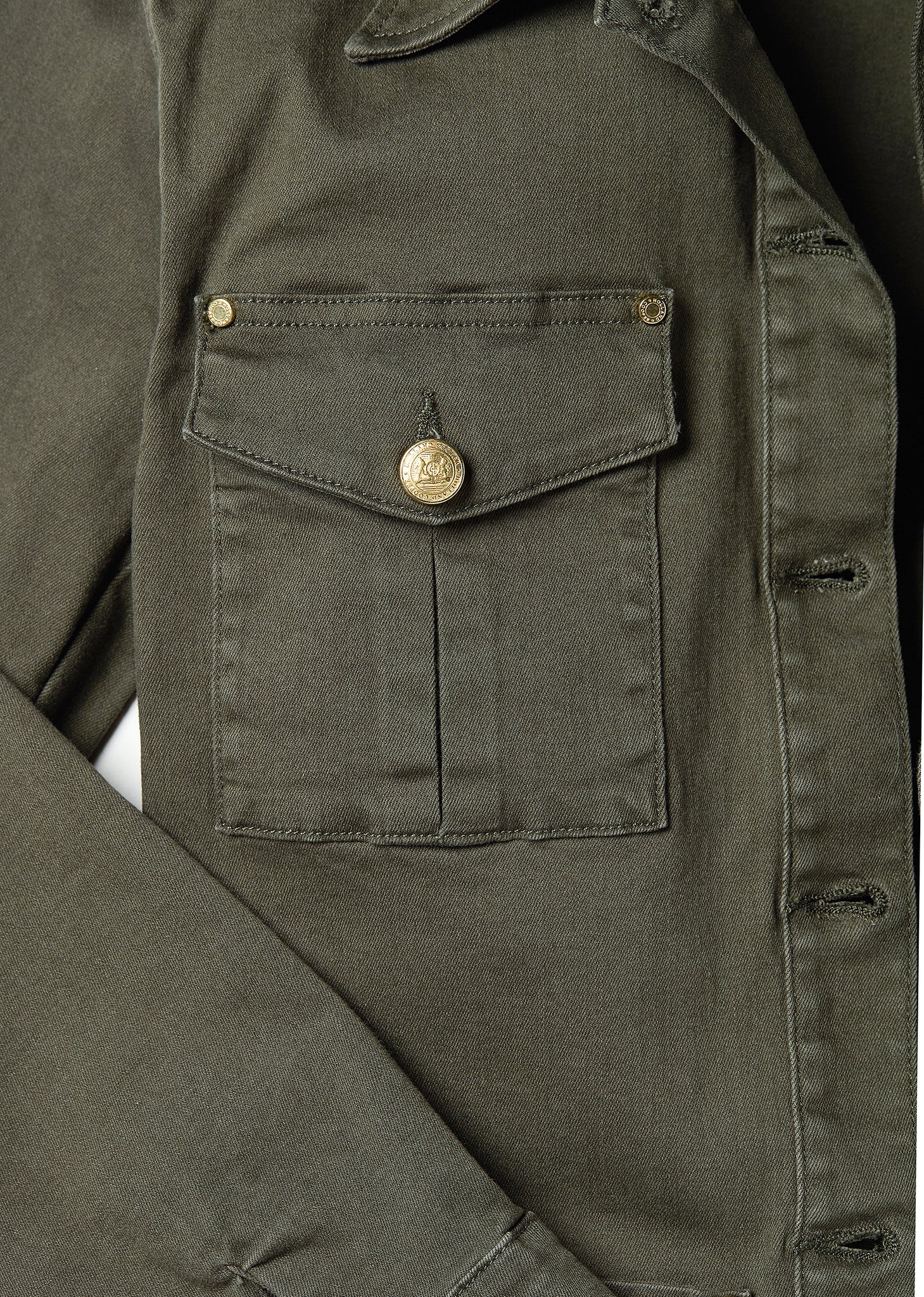 pleated pocket detail on Relaxed fit collared artillery style jacket in khaki with four pockets two chest ones being box pleated  and two hip being patch pockets with gold jean button fastenings adjustable long sleeves and epaulette shoulder detail