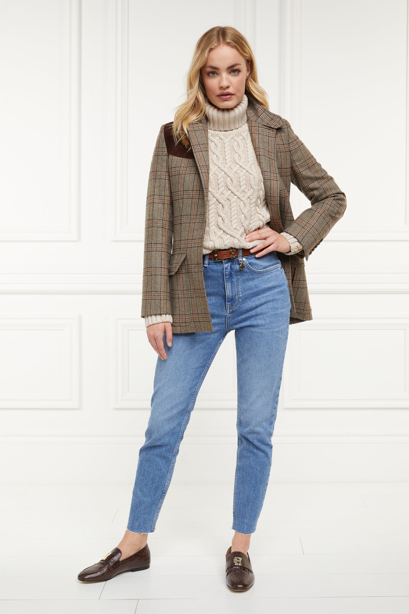 brown croc embossed leather loafers with a slightly pointed toe and gold hardware to the top, paired with a cable roll neck knit in natural and a bredon tweed blazer, brown leather belt and denim slim jeans