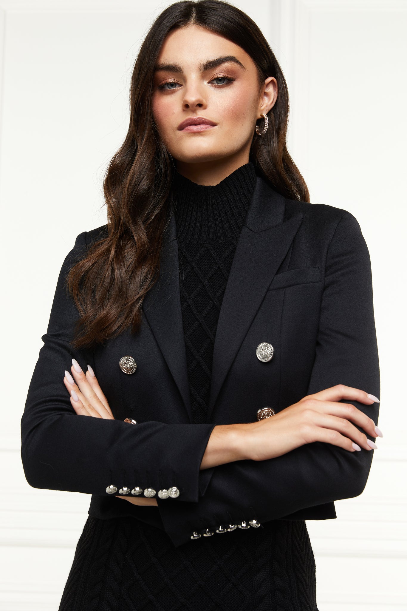 British made tailored cropped jacket in black with welt pockets and gold button detail down the front and on sleeves