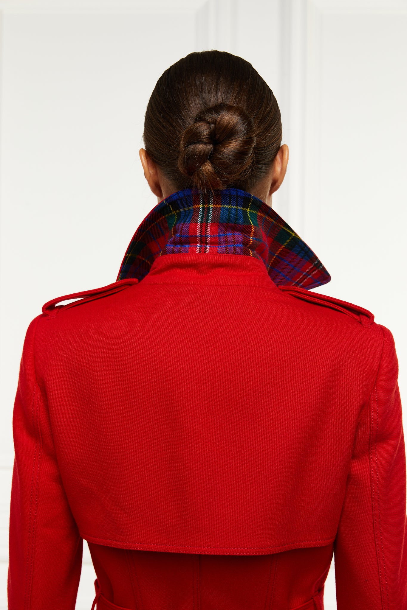 back of under collar detail of womens red double breasted full length wool trench coat