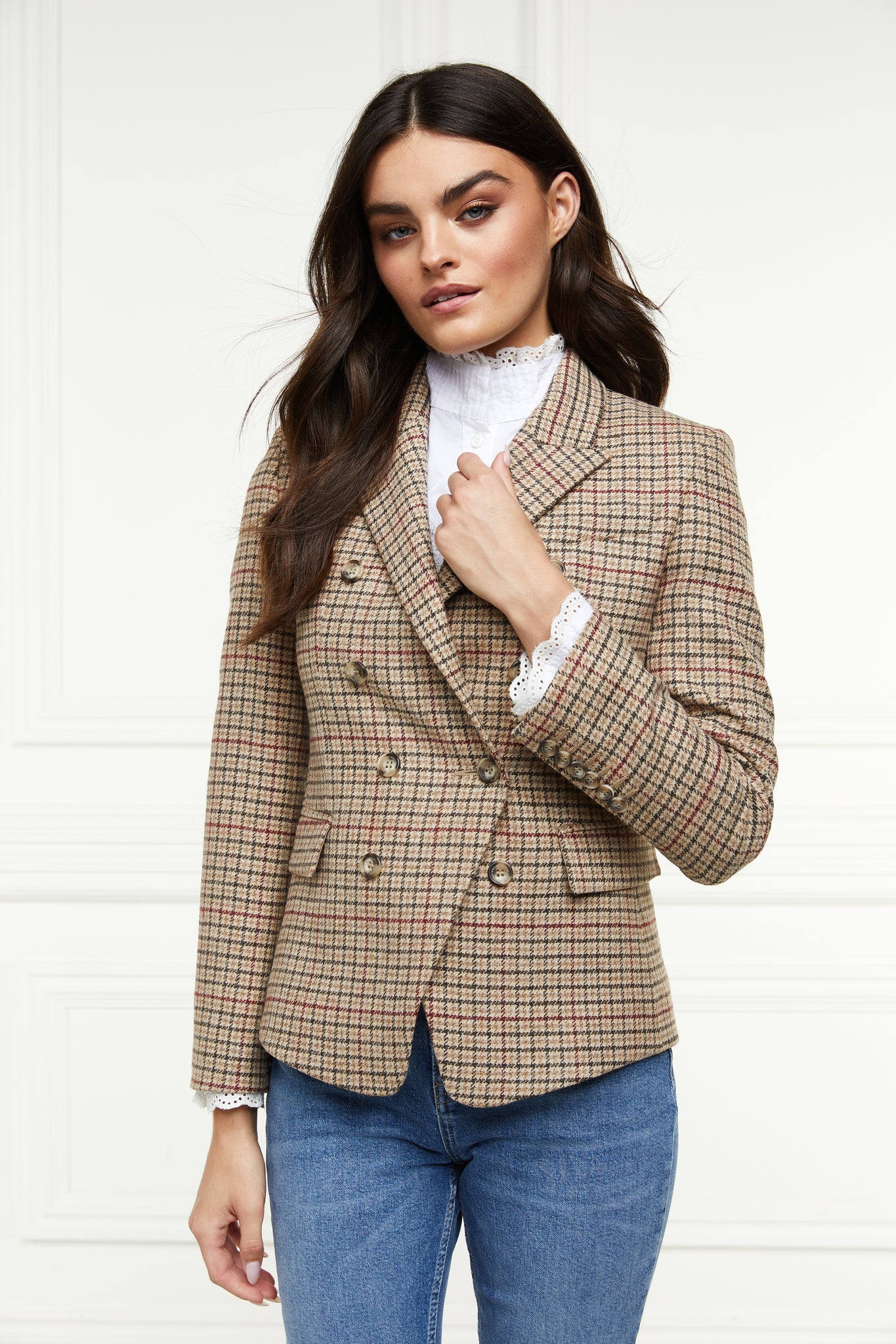 British made double breasted blazer that fastens with a single button hole to create a more form fitting silhouette with two pockets and horn button detailing this blazer is made from camel coloured charlton tweed