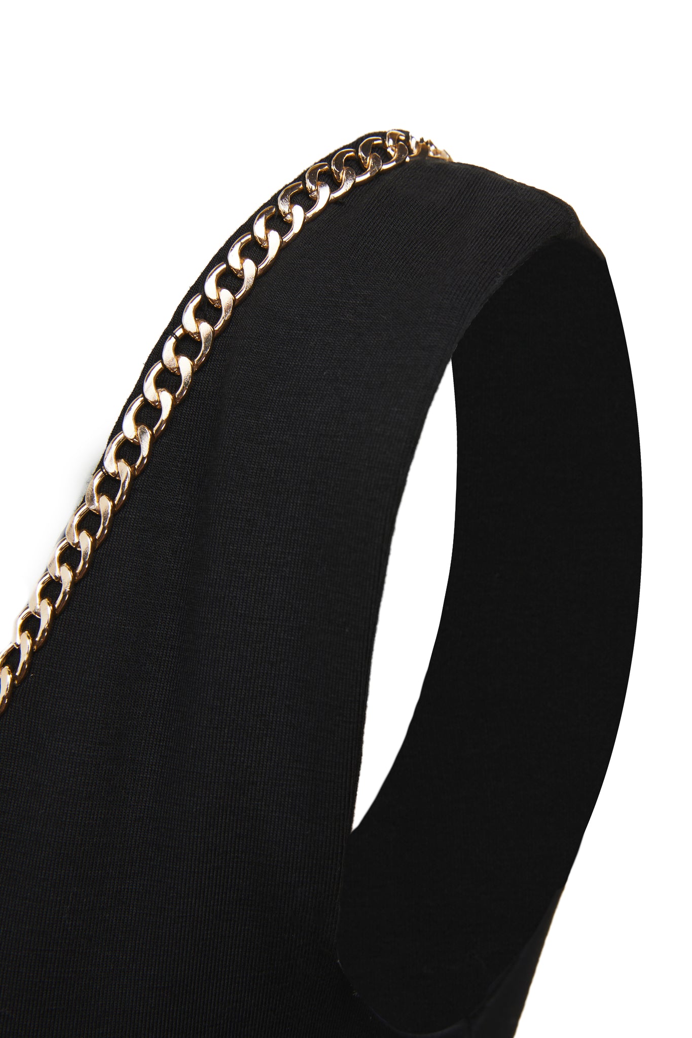 detail shot of gold chain on womens black v neck maxi dress