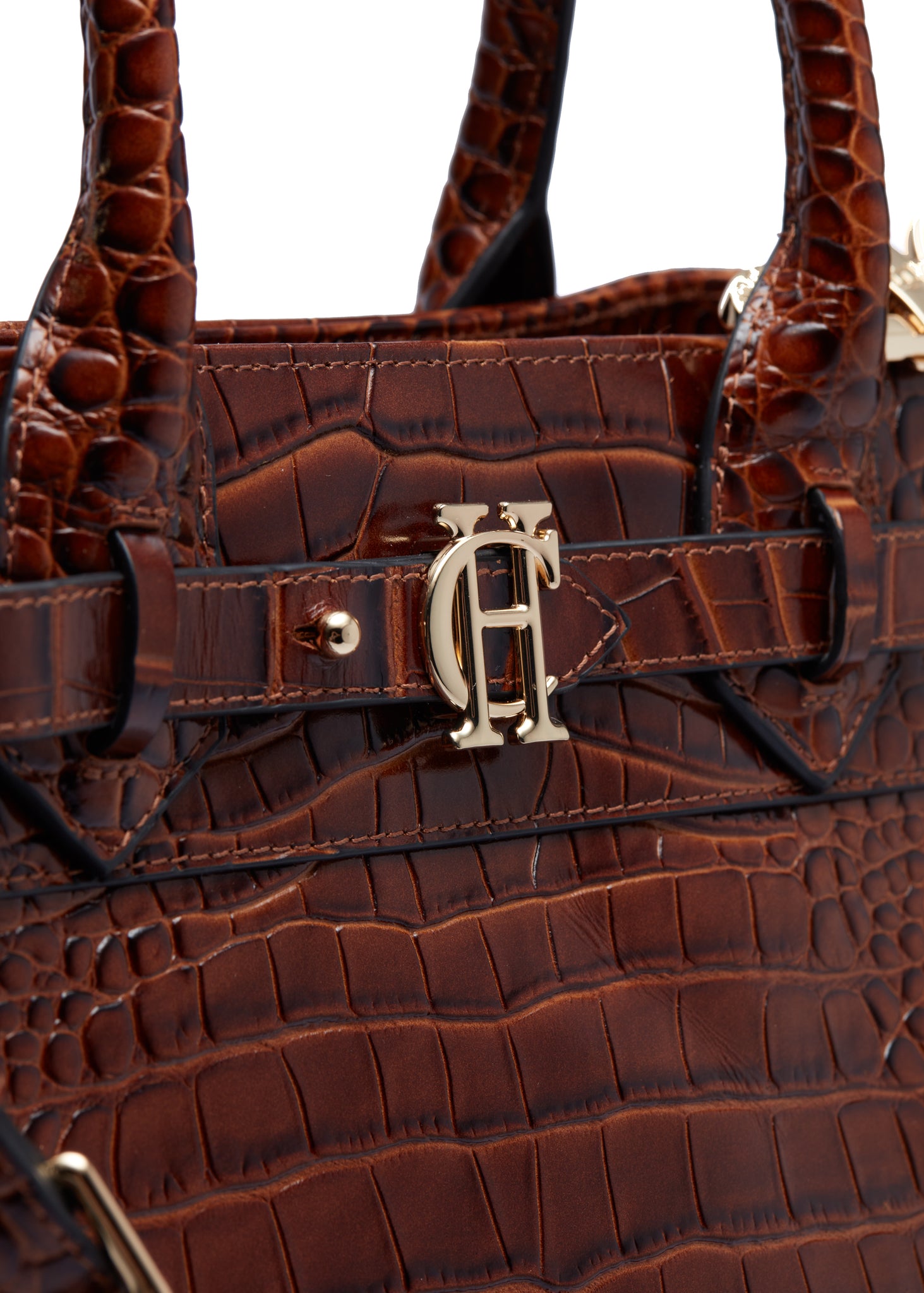 close up of gold hardware on dark brown womens small dark brown croc embossed leather tote bag