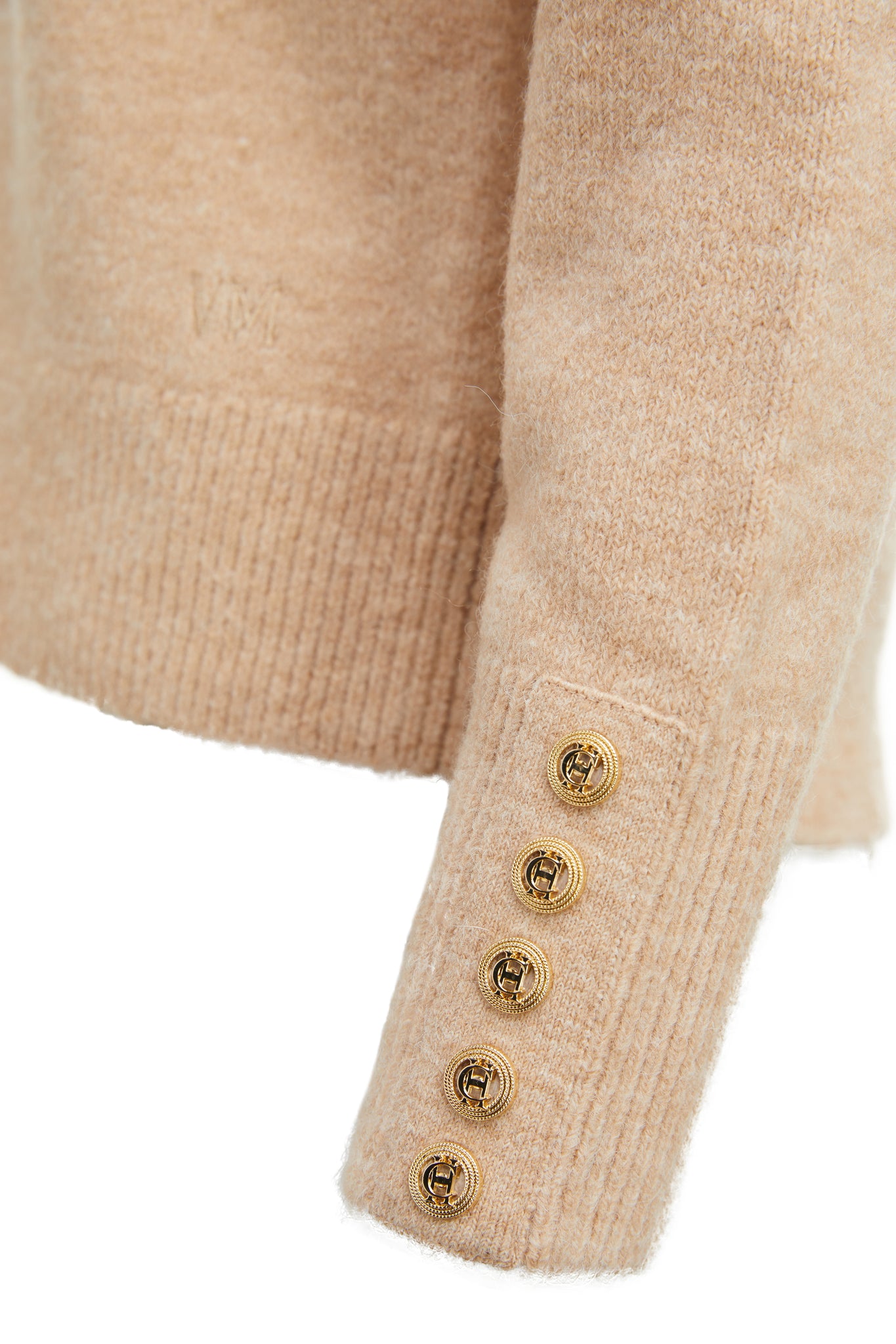 Gold button detail of womens lightweight  v neck knit in stone with gold button cuffs