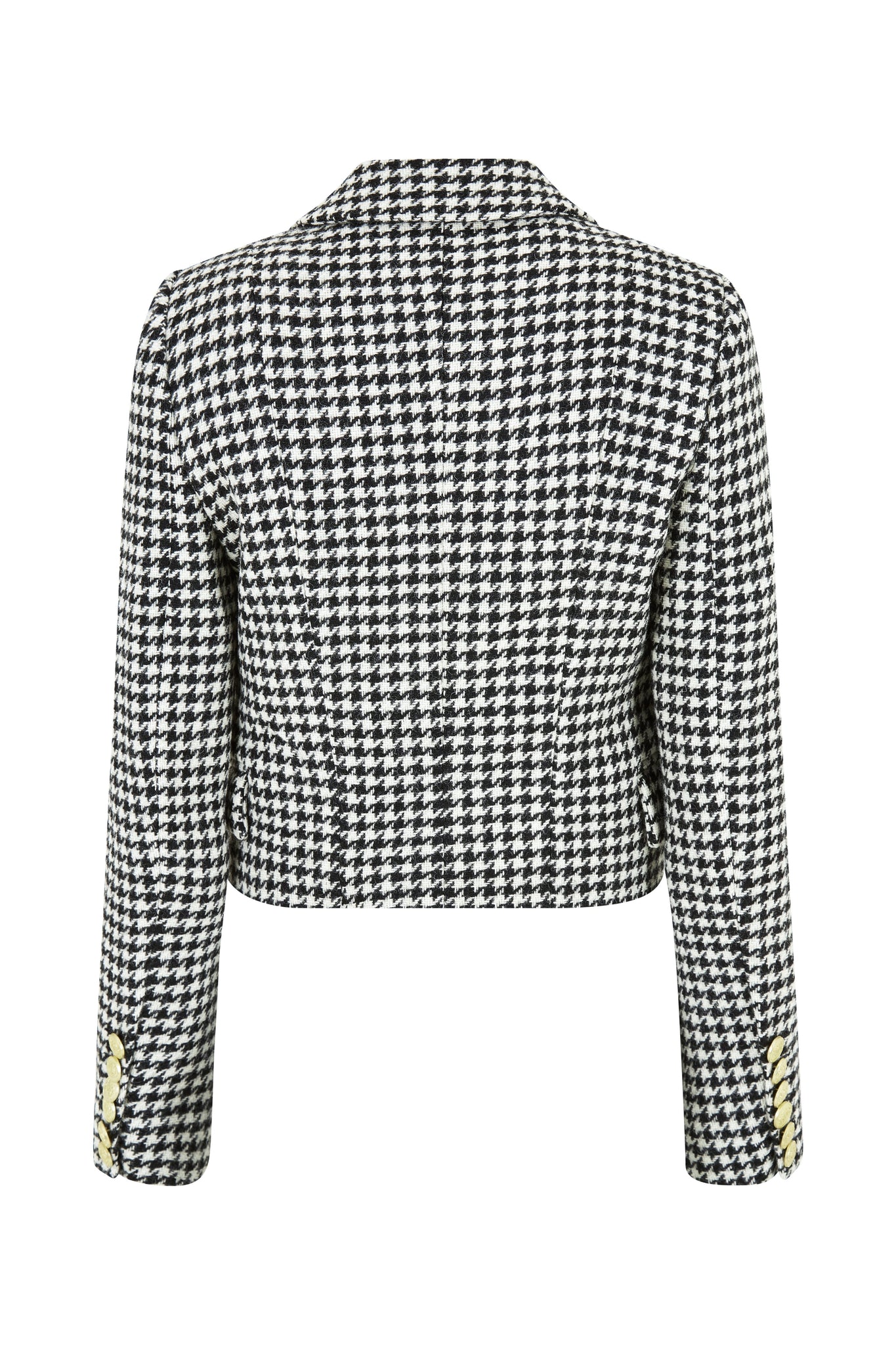 back of British made tailored cropped jacket in black and white houndstooth with welt pockets and gold button detail down the front and on sleeves