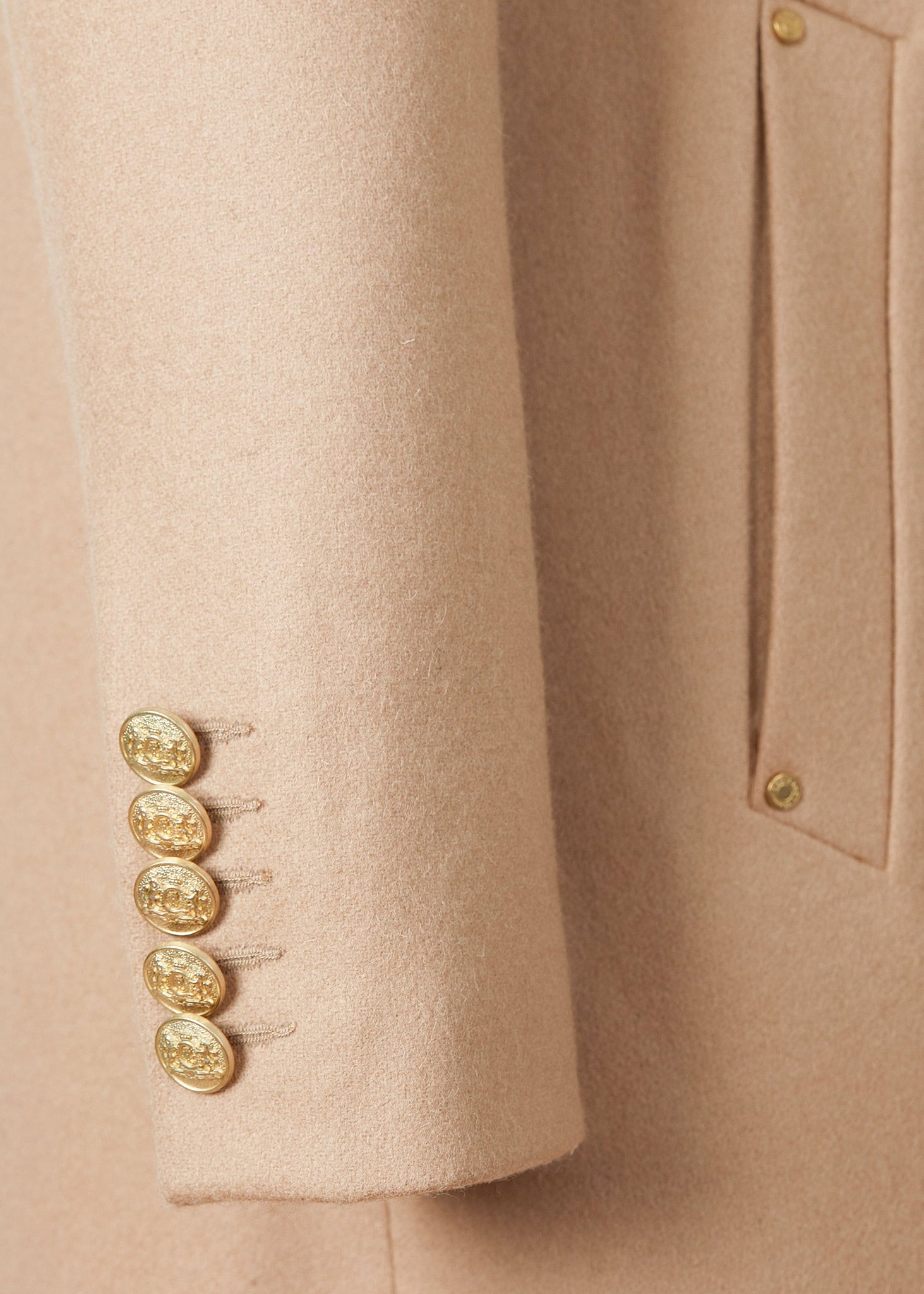 Sleeve detail of Womens camel wool double breasted mid-length tweed coat 