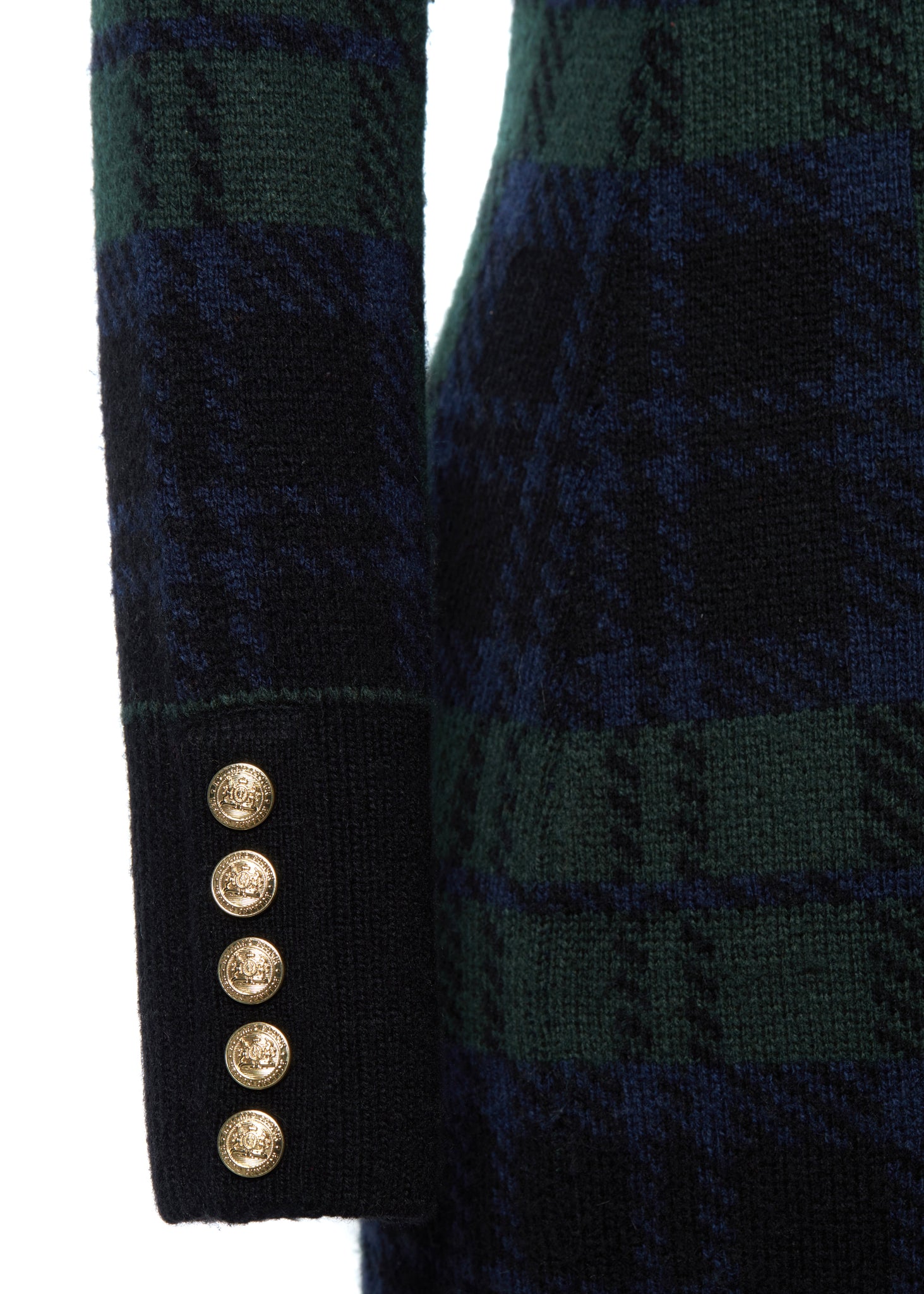 gold detail of cuff of womens green navy and black blackwatch roll neck jumper dress with contrast black cuffs and ribbed hem 