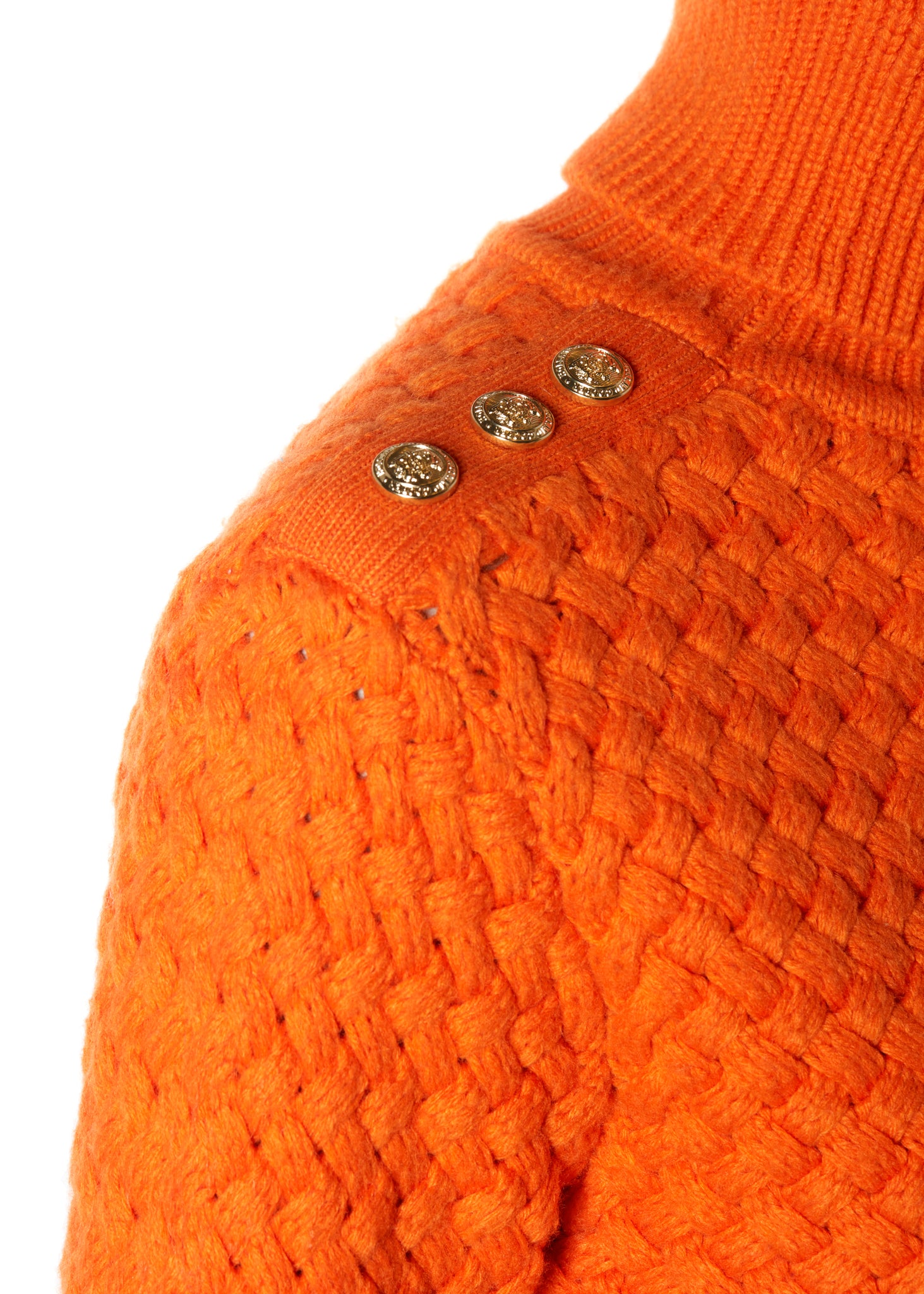 gold button detail across shoulder of womens lightweight roll neck basket weave knit jumper in orange