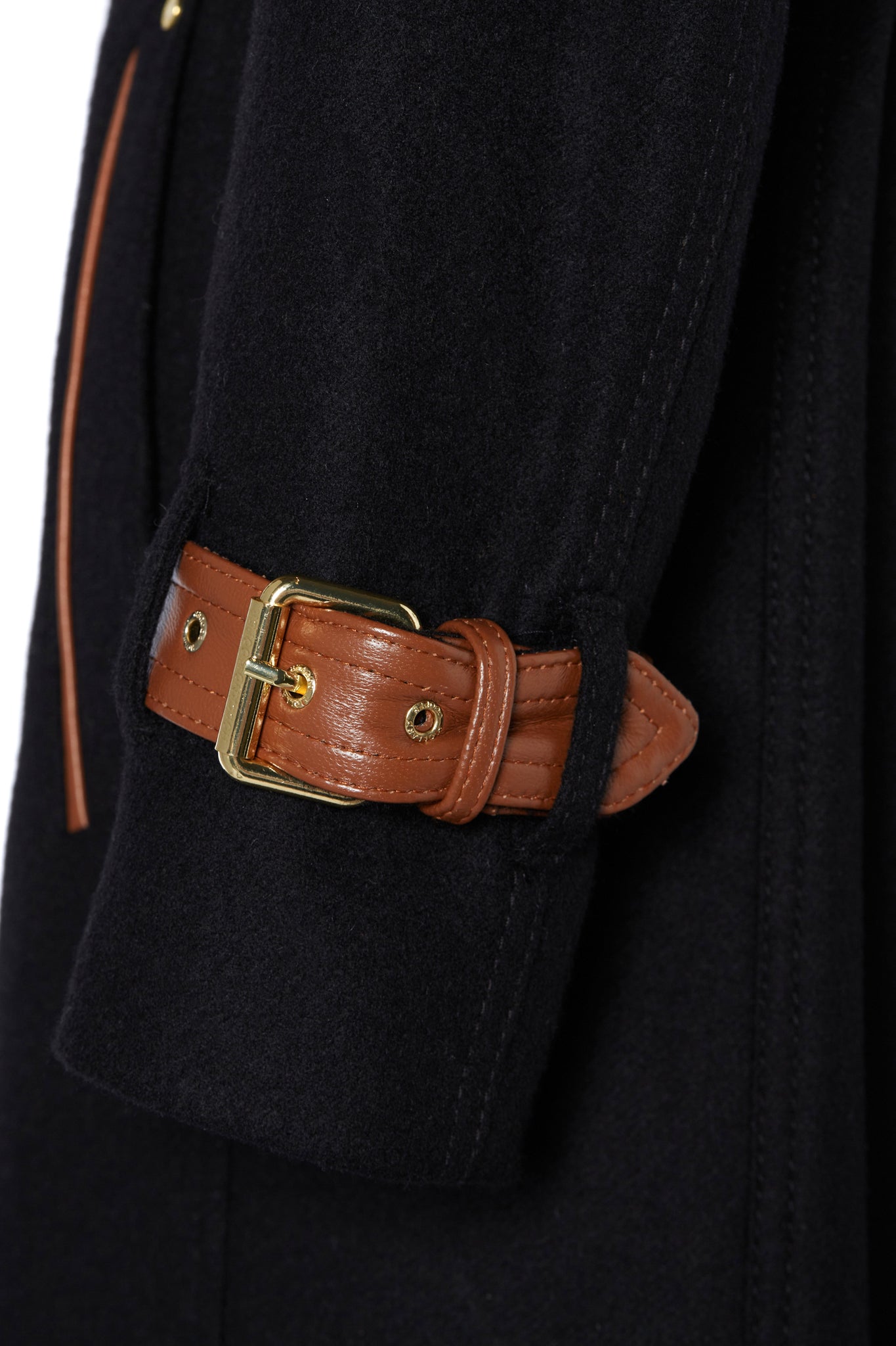 Sleeve detail on tan leather strap on womens black wool and tan leather double breasted full length trench coat 