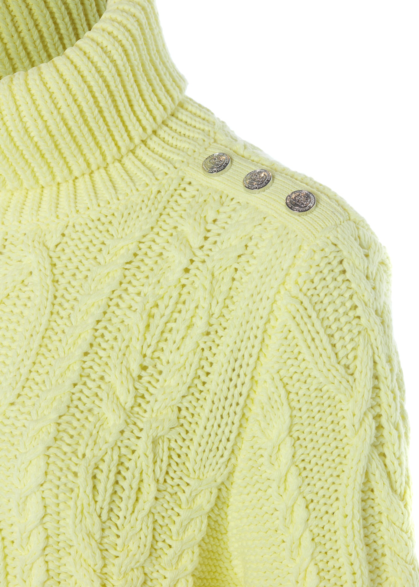 silver button detail across shoulders chunky cable knit jumper in lemon yellow with ribbed roll neck hem and cuffs