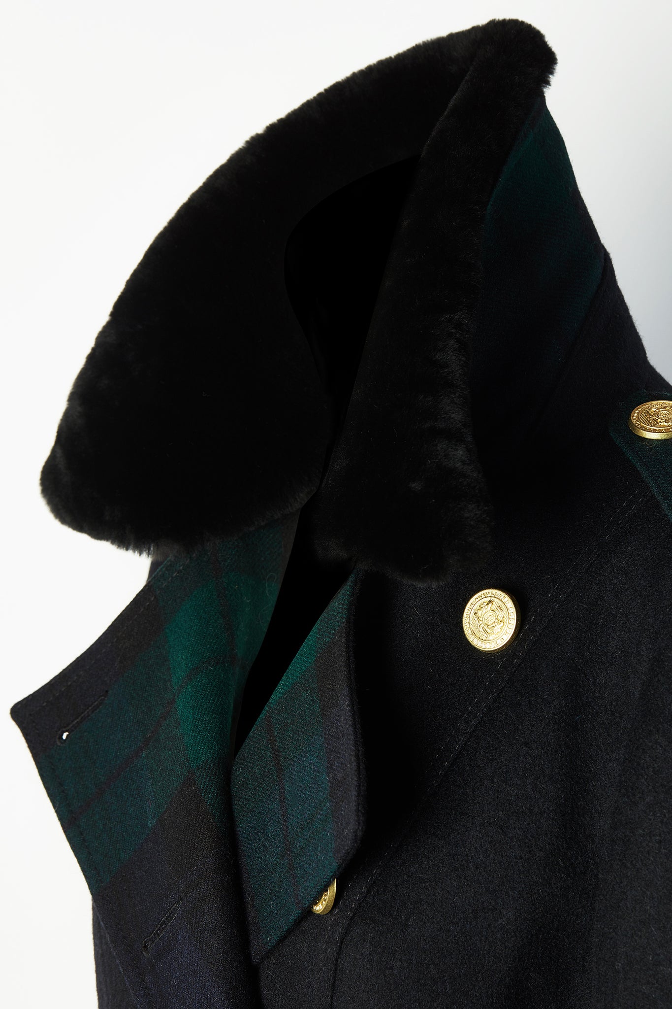 Black faux fur collar on womens navy and green blackwatch houndstooth double breasted full length trench coat with black faux fur collar and cuffs