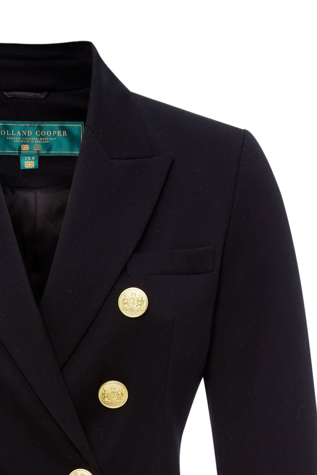 lapel and gold button detail on British made double breasted blazer that fastens with a single button hole to create a more form fitting silhouette with two pockets and gold button detailing this blazer is made from black barathea