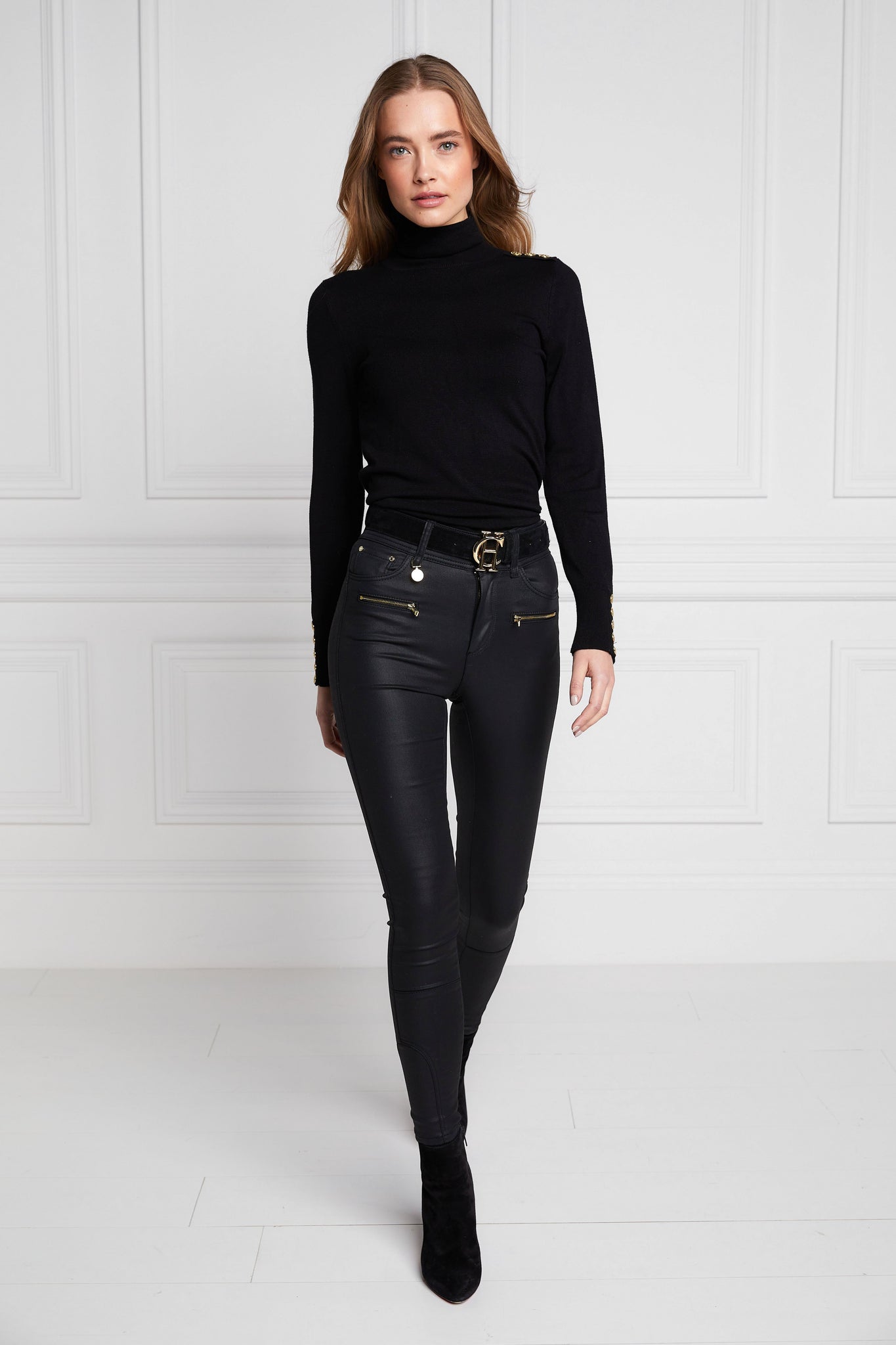 womens high rise black coated skinny jean for a waxed look with jodhpur style seams and two open zip pockets to the front with HC branded pulls