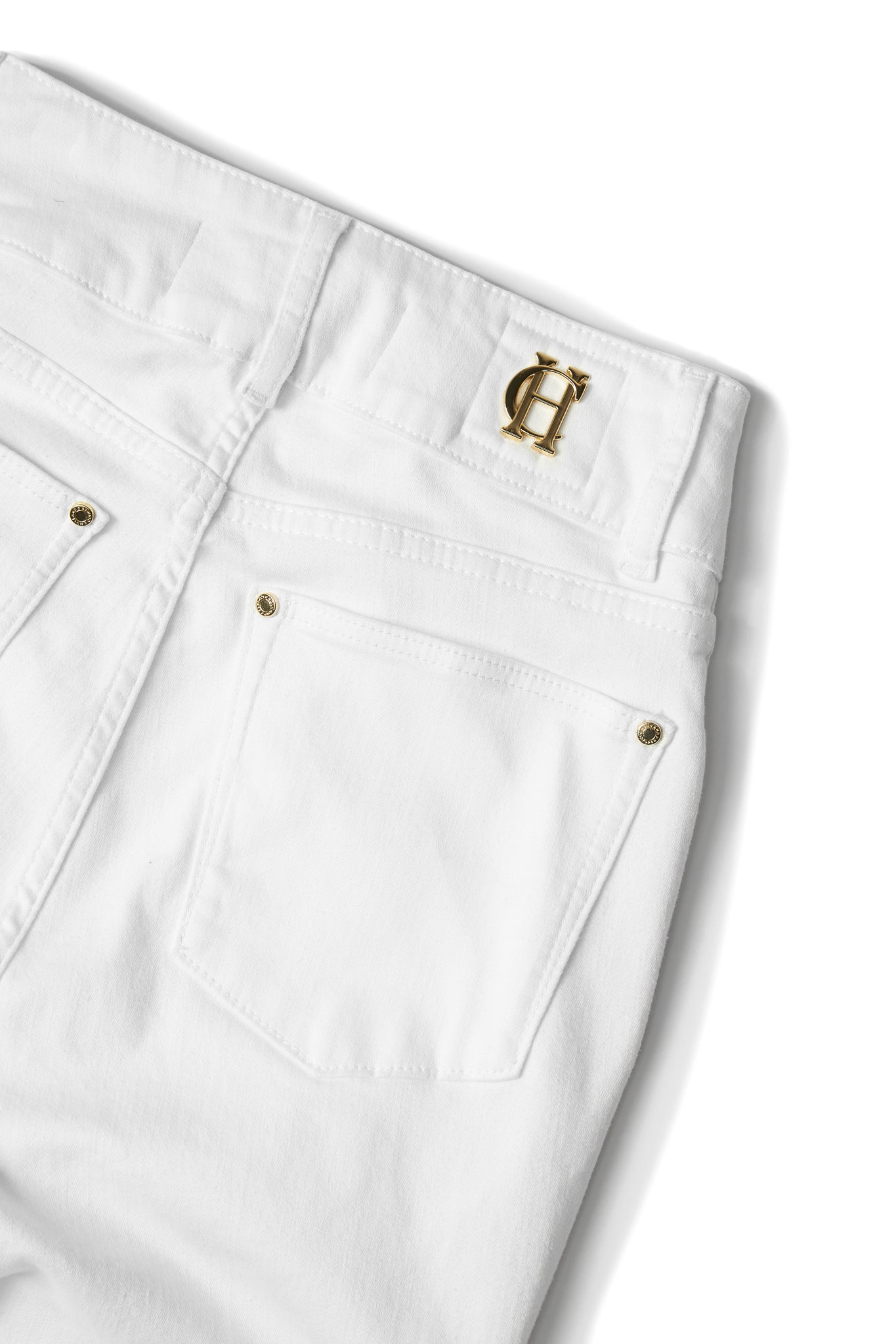 gold hardware detail on back waistband on womens high rise white flared jean with centre front zip fly fastening with two open pockets at the front and back