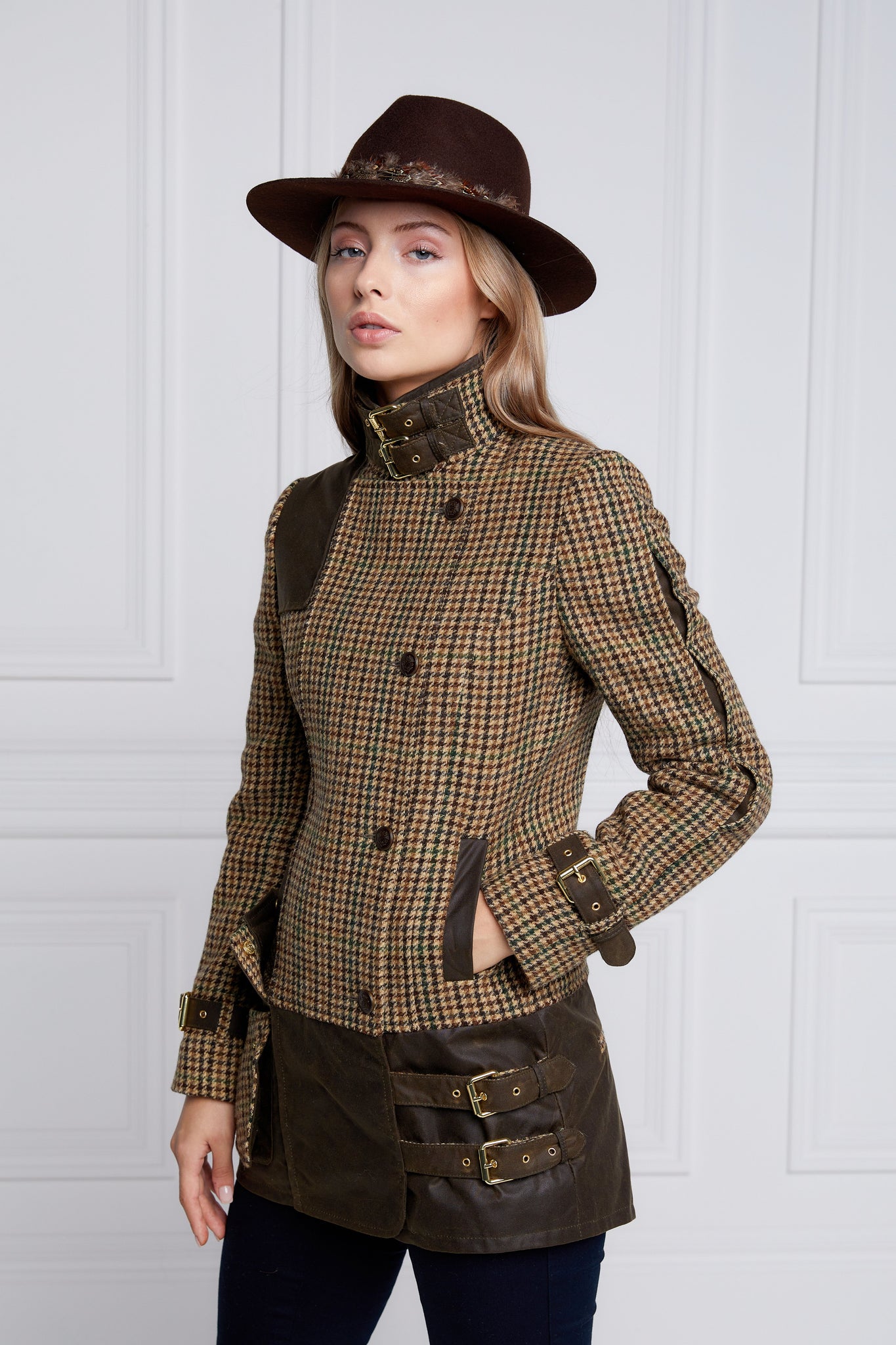 womens fitted field jacket in stone brown and green houndstooth tweed trimmed with contrast chocolate Millerain Wax fabric on shoulder across back and on the hip finished with horn button fastenings an buckles on the collar cuffs and hip