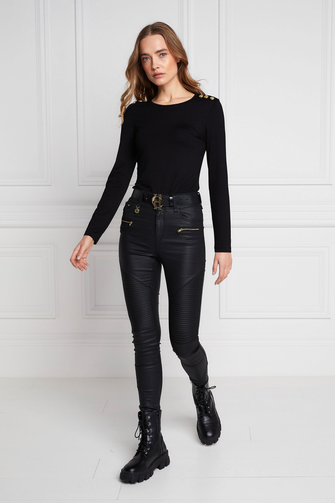 womens high rise black coated skinny jean for a leather look with pin tuck biker panels to front and two open zip pockets on front with two open pockets on back