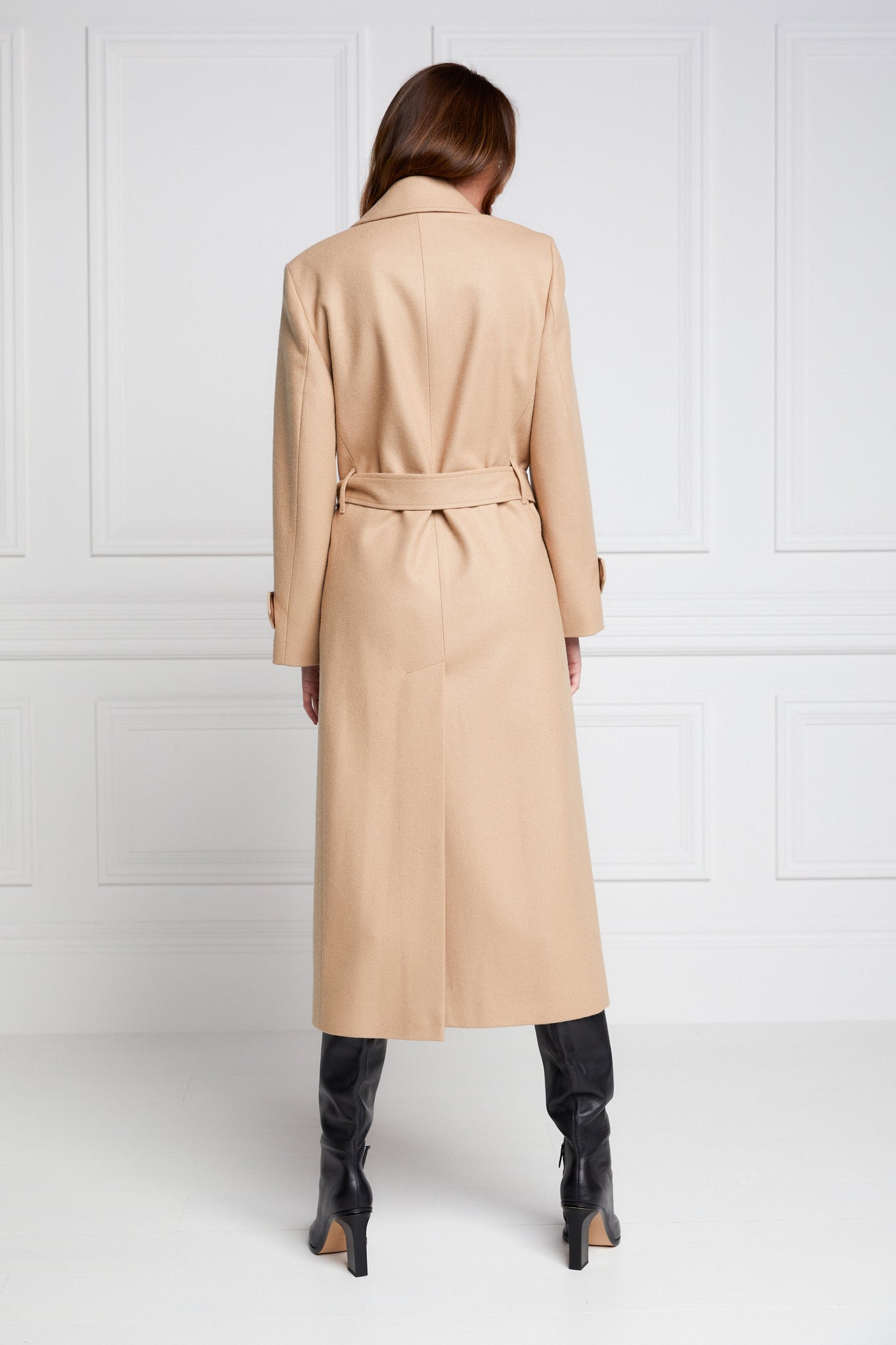 back of Womens camel mid length wrap coat with tie belt