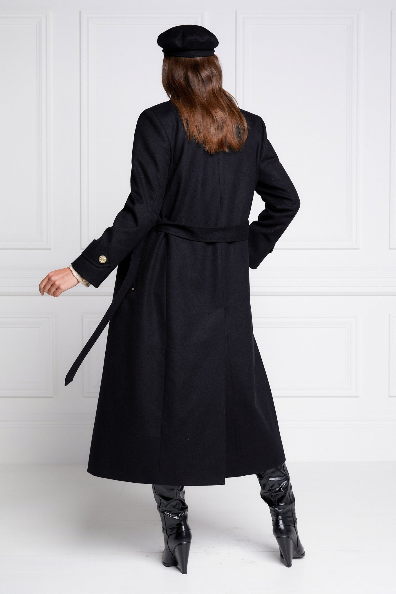 back of Womens black wool mid length wrap coat with tie belt