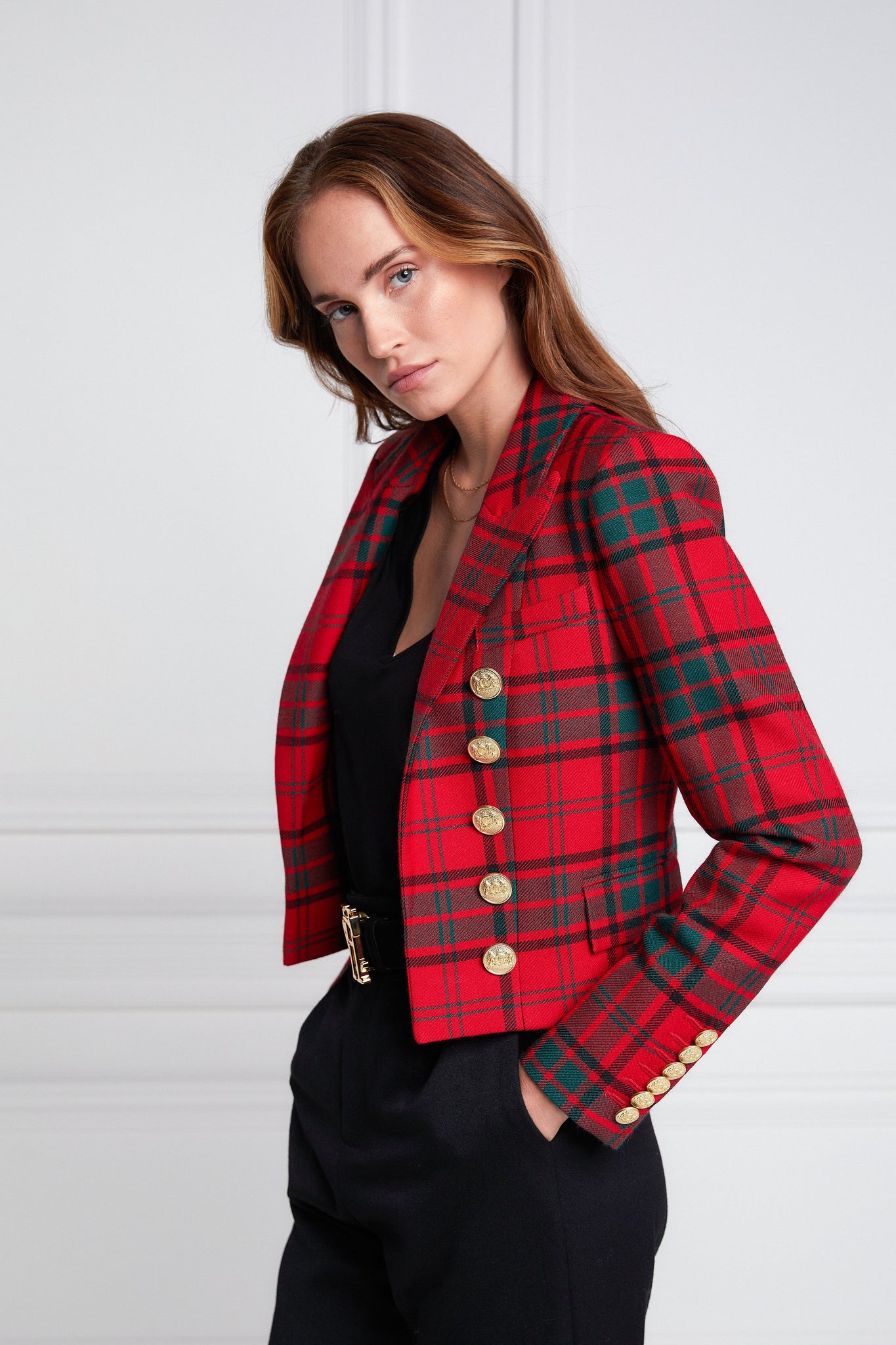 British made tailored cropped jacket in red and green tarten with welt pockets and gold button detail down the front and on sleeves