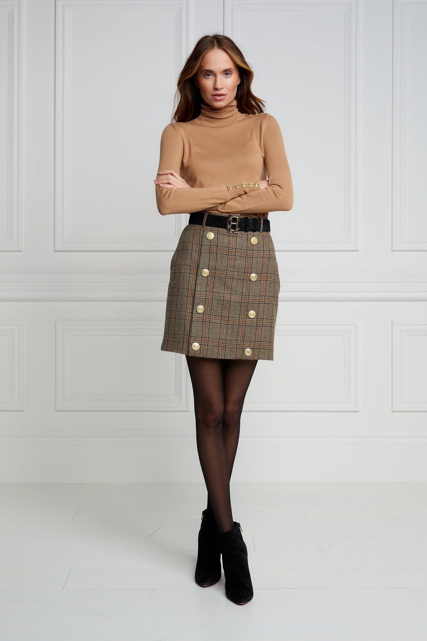 womens wool pencil mini skirt in green and red tweed check with concealed zip fastening on centre back and gold rivets down front