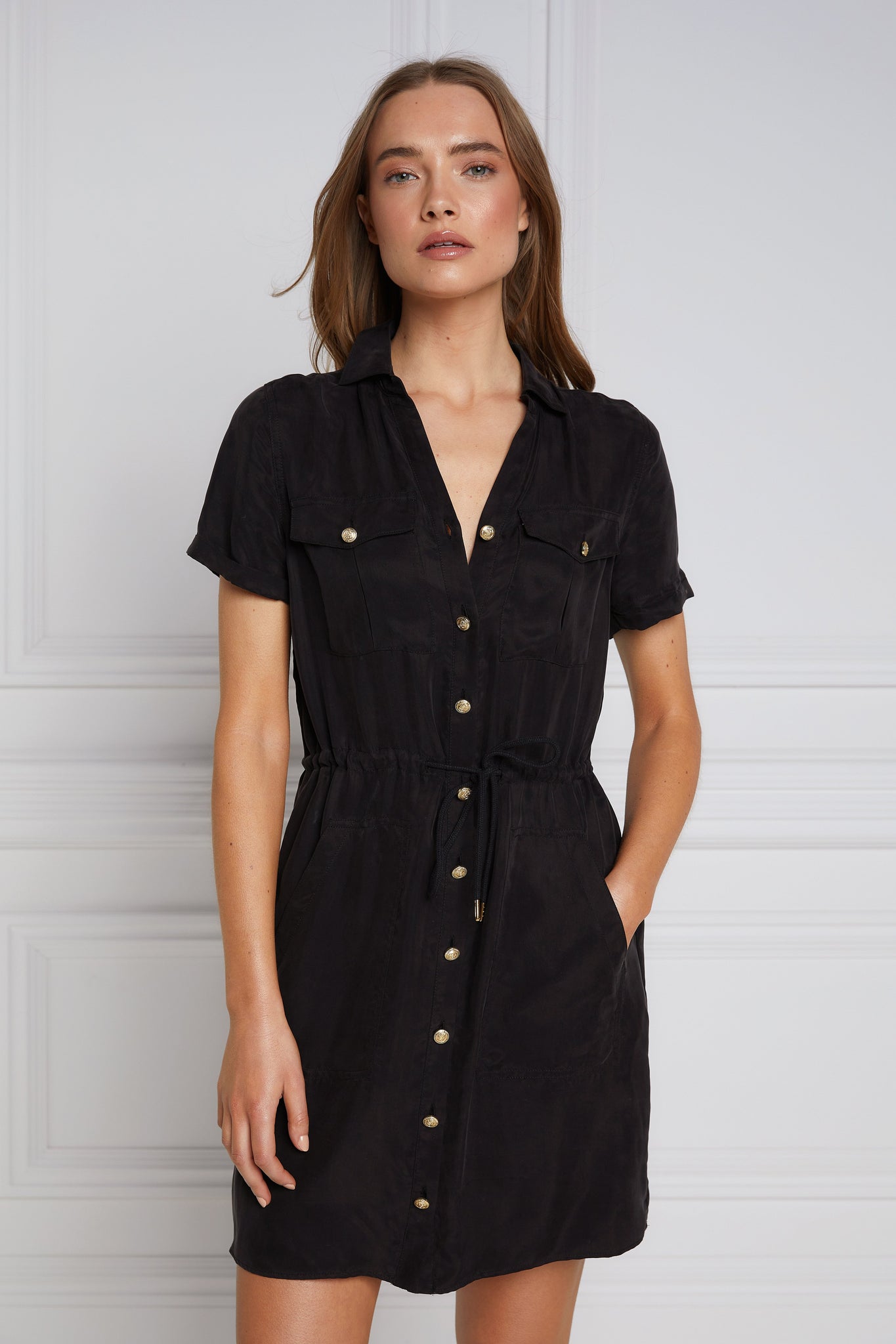 womens black military mini shirt dress with drawcord tie around the waist and gold buttons down the front