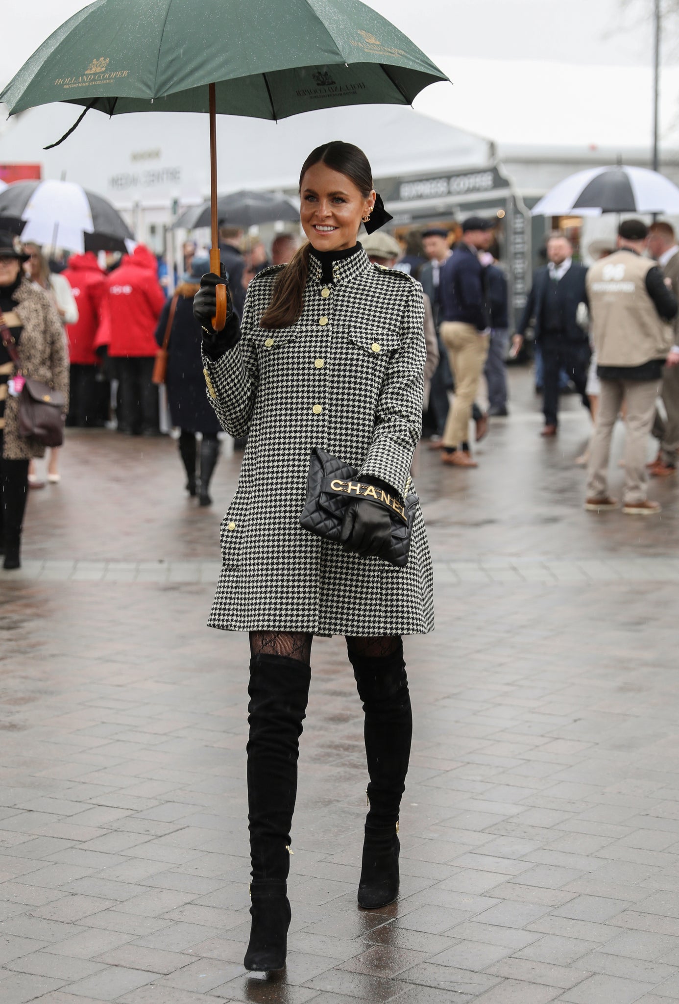 Jade Holland Cooper, owner of Holland Cooper in Womens black and white houndstooth front buttoned tweed cape coat