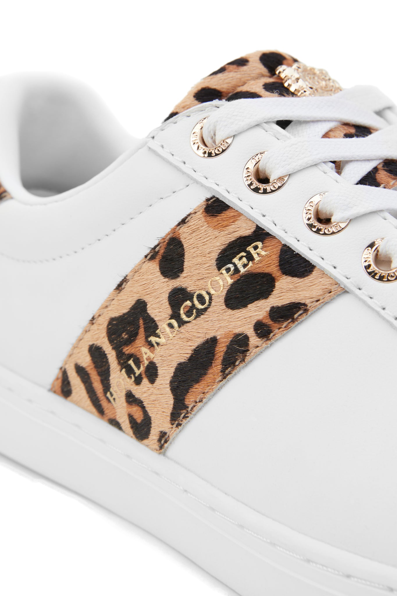 Close up of the leopard print side stripe on trainers and gold hardware