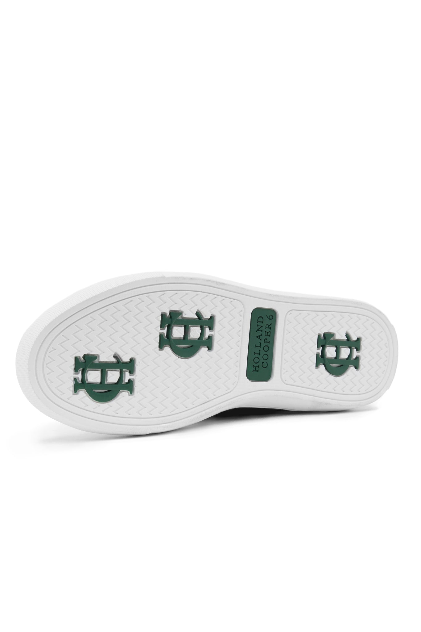 White leather sole with dark green branding