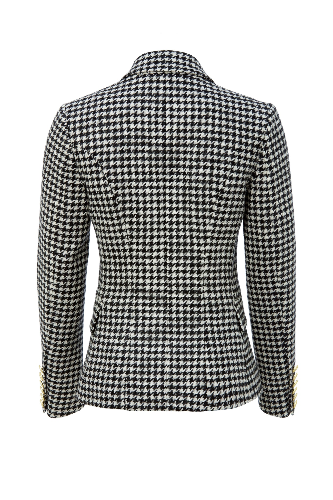back of British made double breasted blazer that fastens with a single button hole to create a more form fitting silhouette with two pockets and gold button detailing this blazer in black and white houndstooth