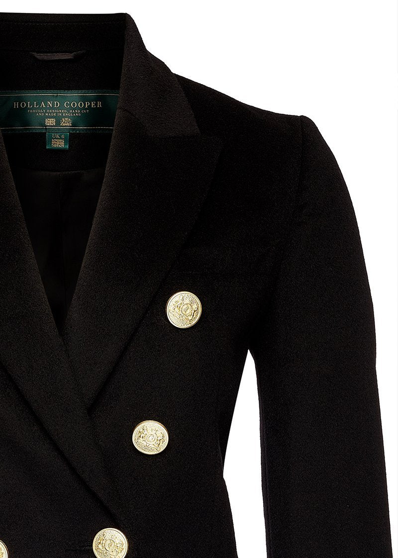 collar detail of black wool womens coat with gold hardware
