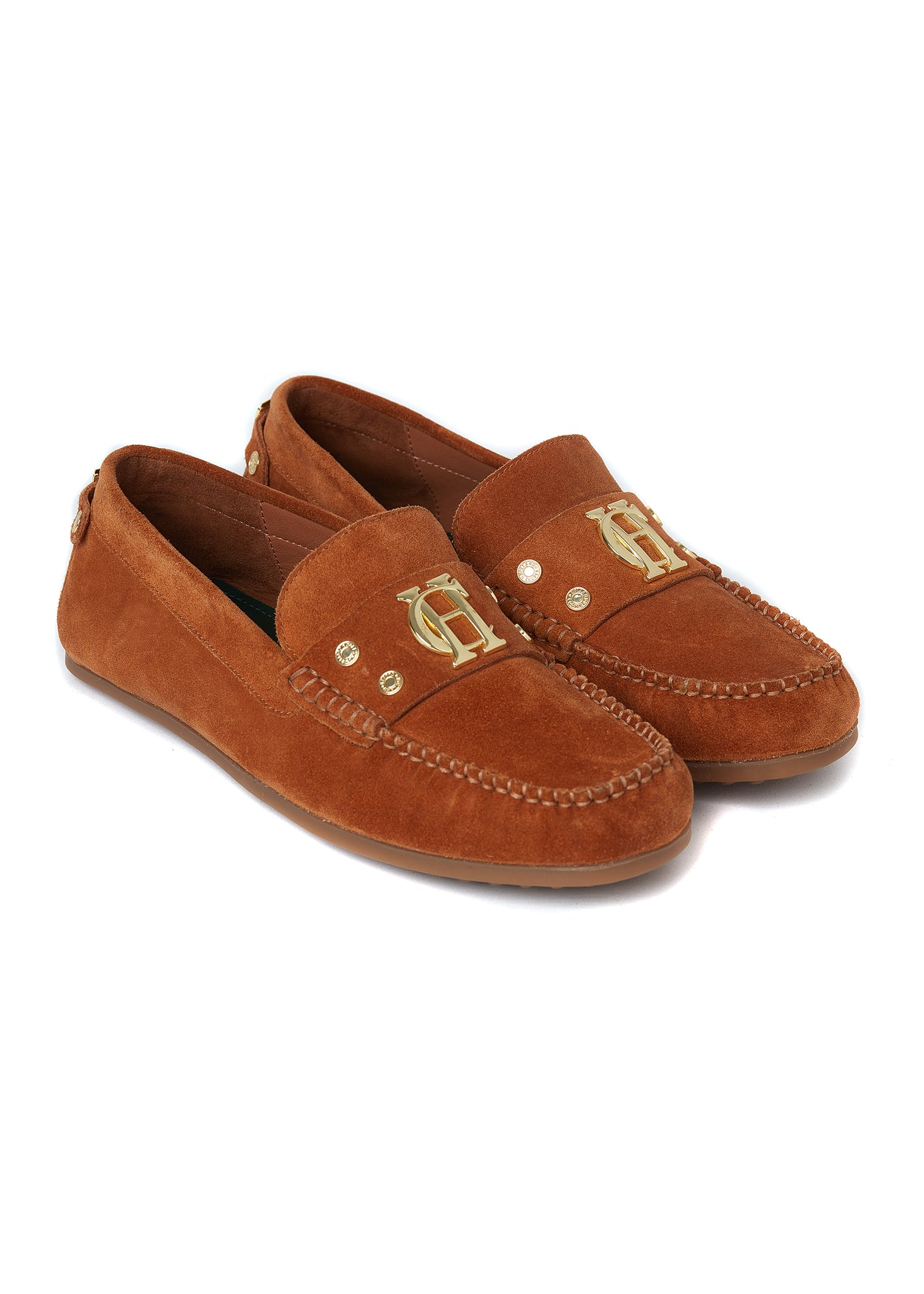 classic tan suede loafers with a leather sole and top stitching details and gold hardware 