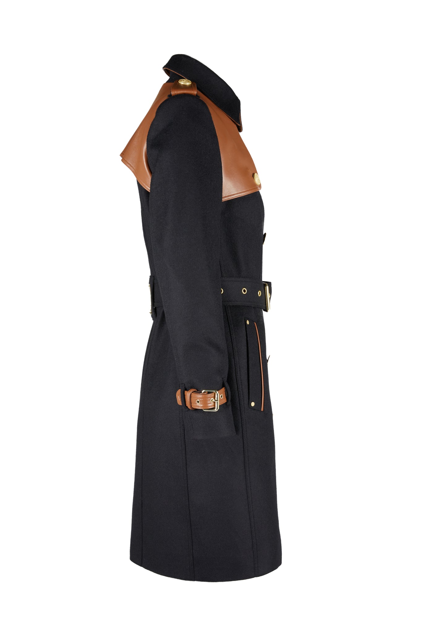 Side profile of womens black and tan brown leather detailed with gold hardware knee length wool trench coat