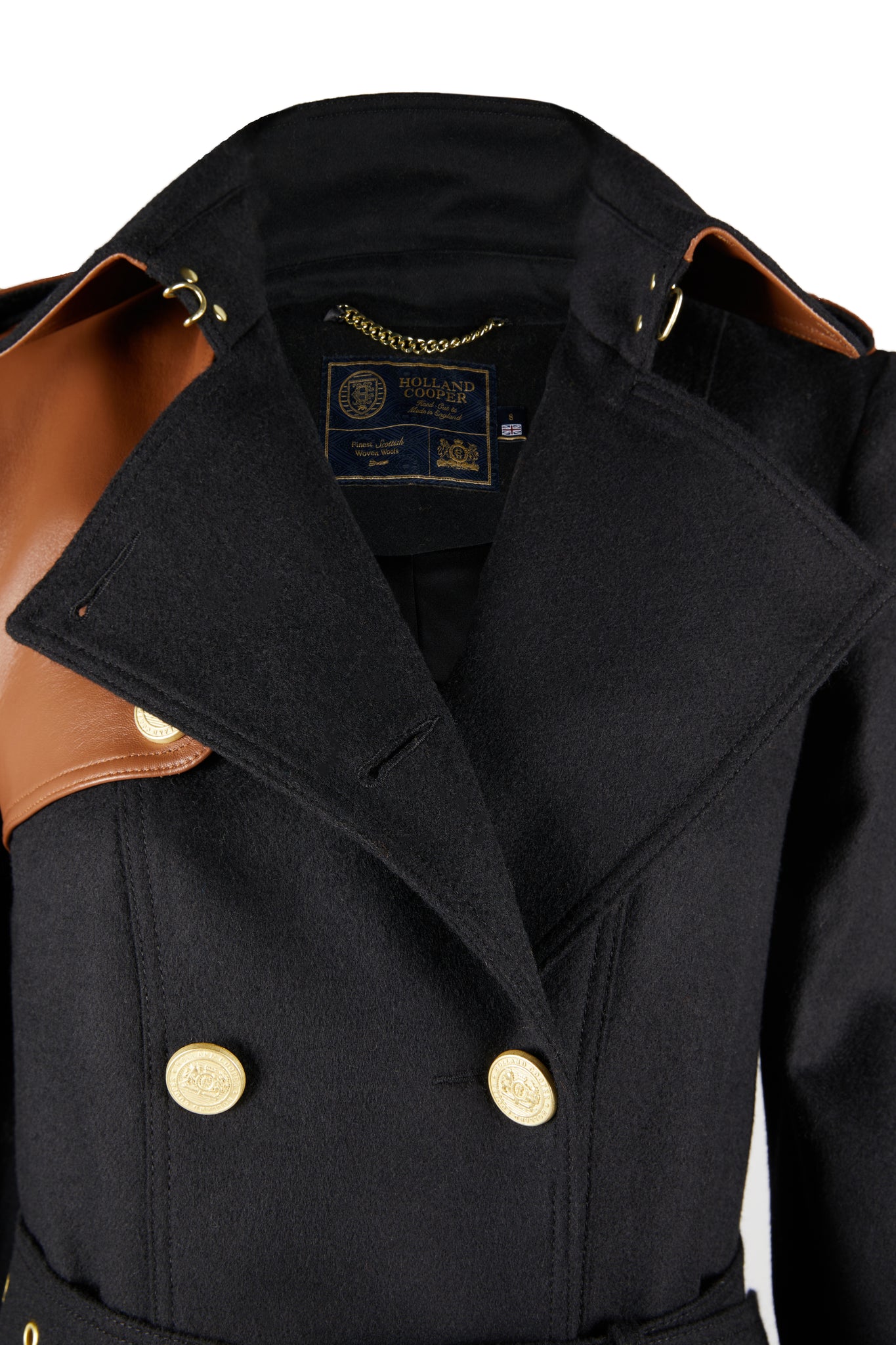 Open collar detail of Womens black and tan brown leather detailed with gold hardware knee length wool trench coat