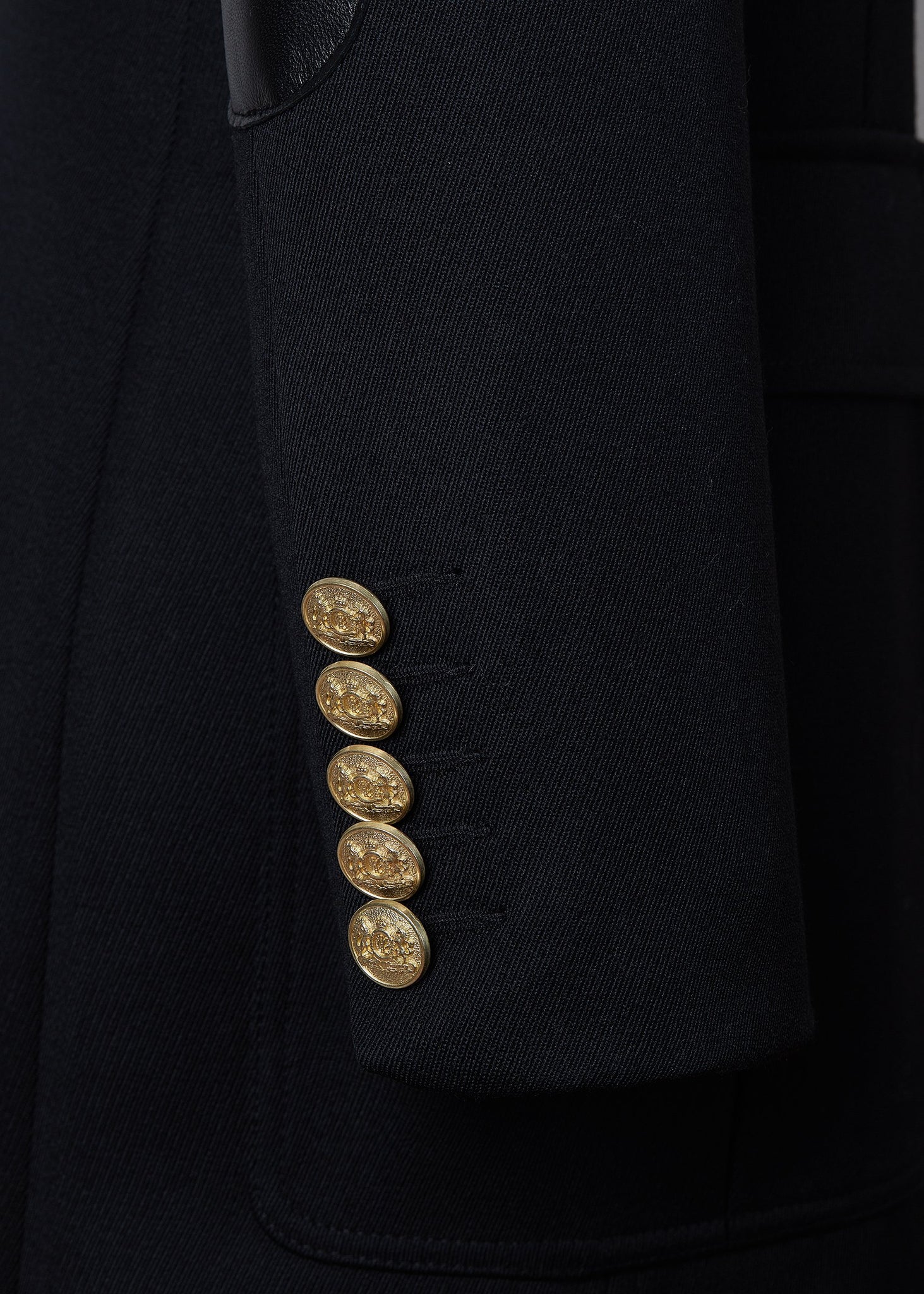 gold button detail on cuffs og relaxed fit single breasted blazer breasted blazer in black with patch pockets and tonal black leather elbow patches and collar