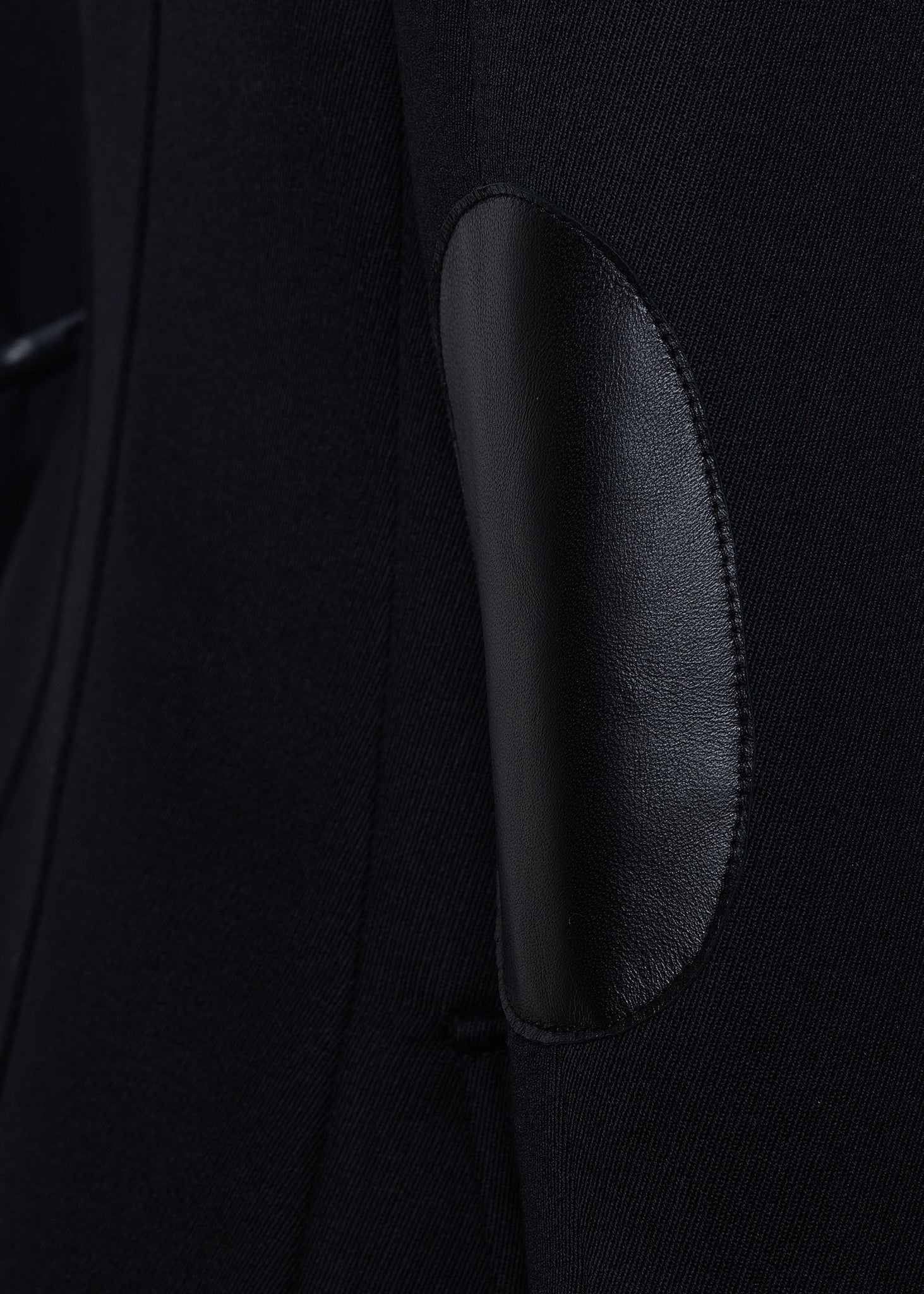 leather elbow patch on relaxed fit single breasted blazer breasted blazer in black with patch pockets and tonal black leather elbow patches and collar