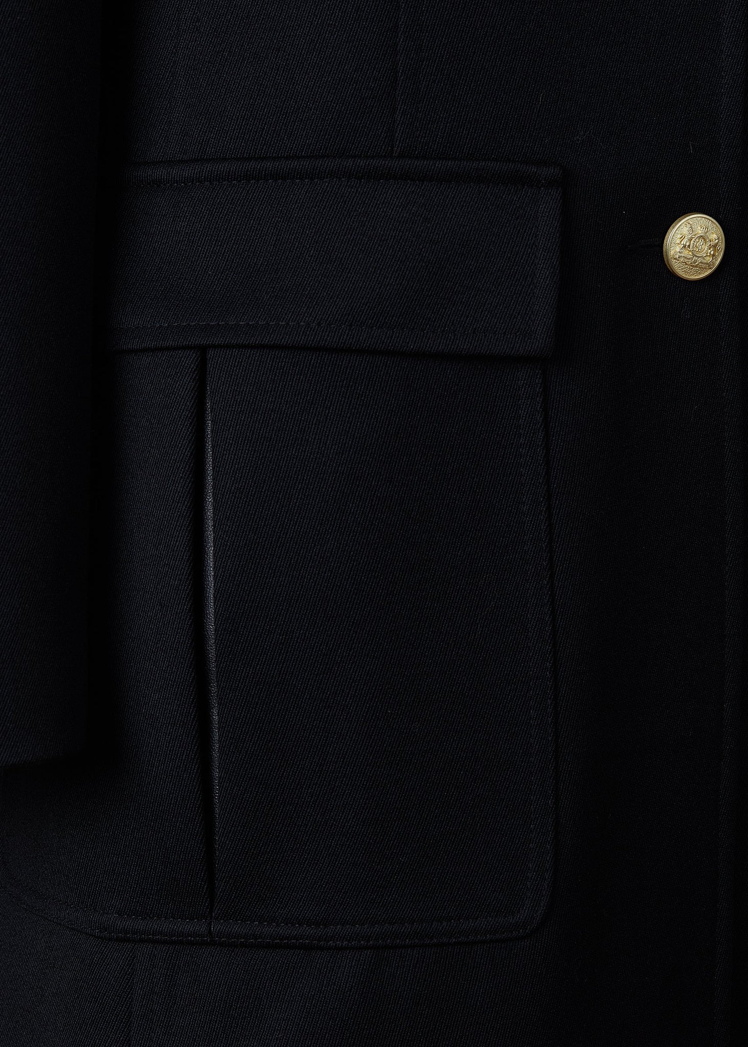 pocket detail on relaxed fit single breasted blazer breasted blazer in black with patch pockets and tonal black leather elbow patches and collar