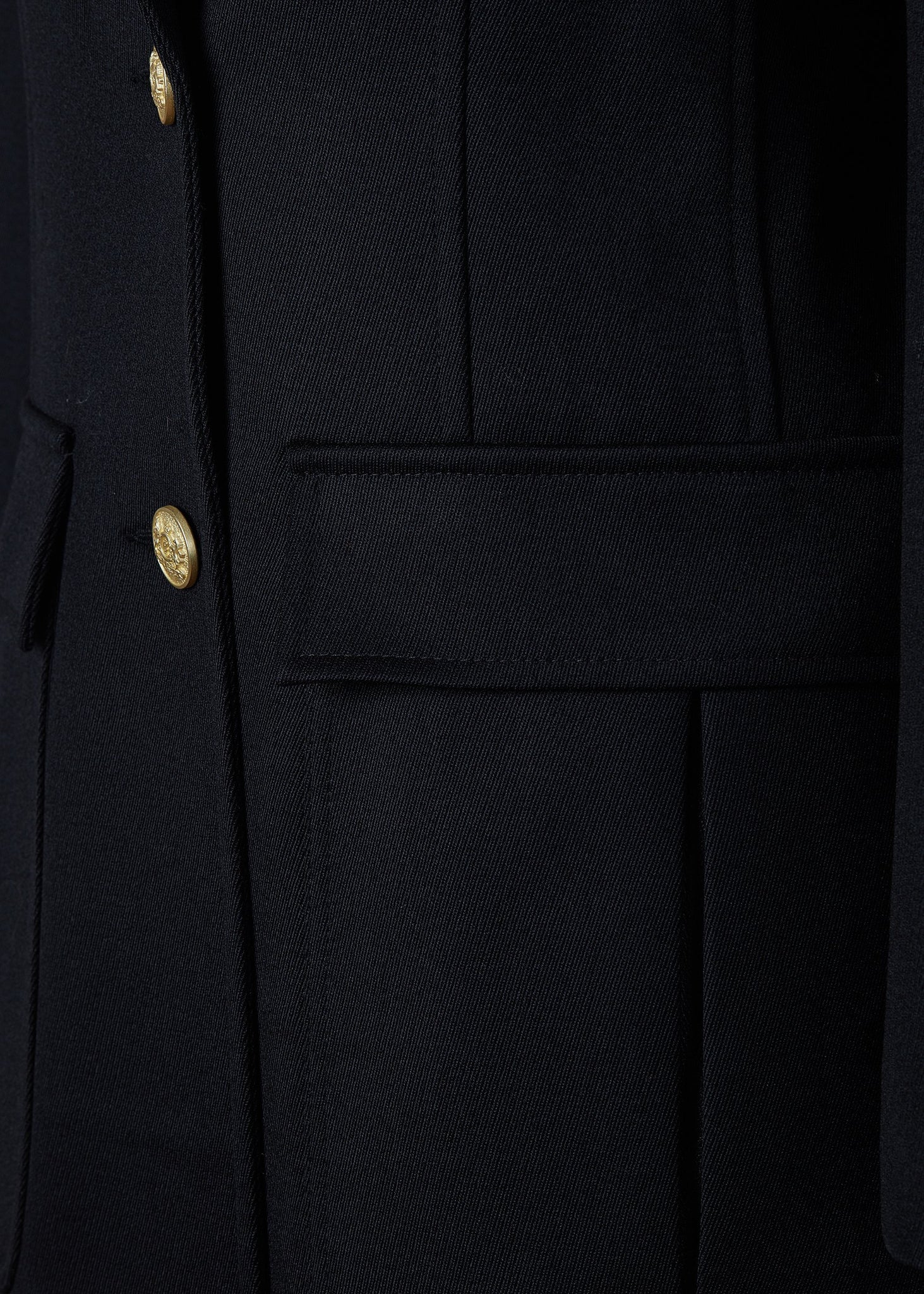 pocket detail and gold front buttons on relaxed fit single breasted blazer breasted blazer in black with patch pockets and tonal black leather elbow patches and collar