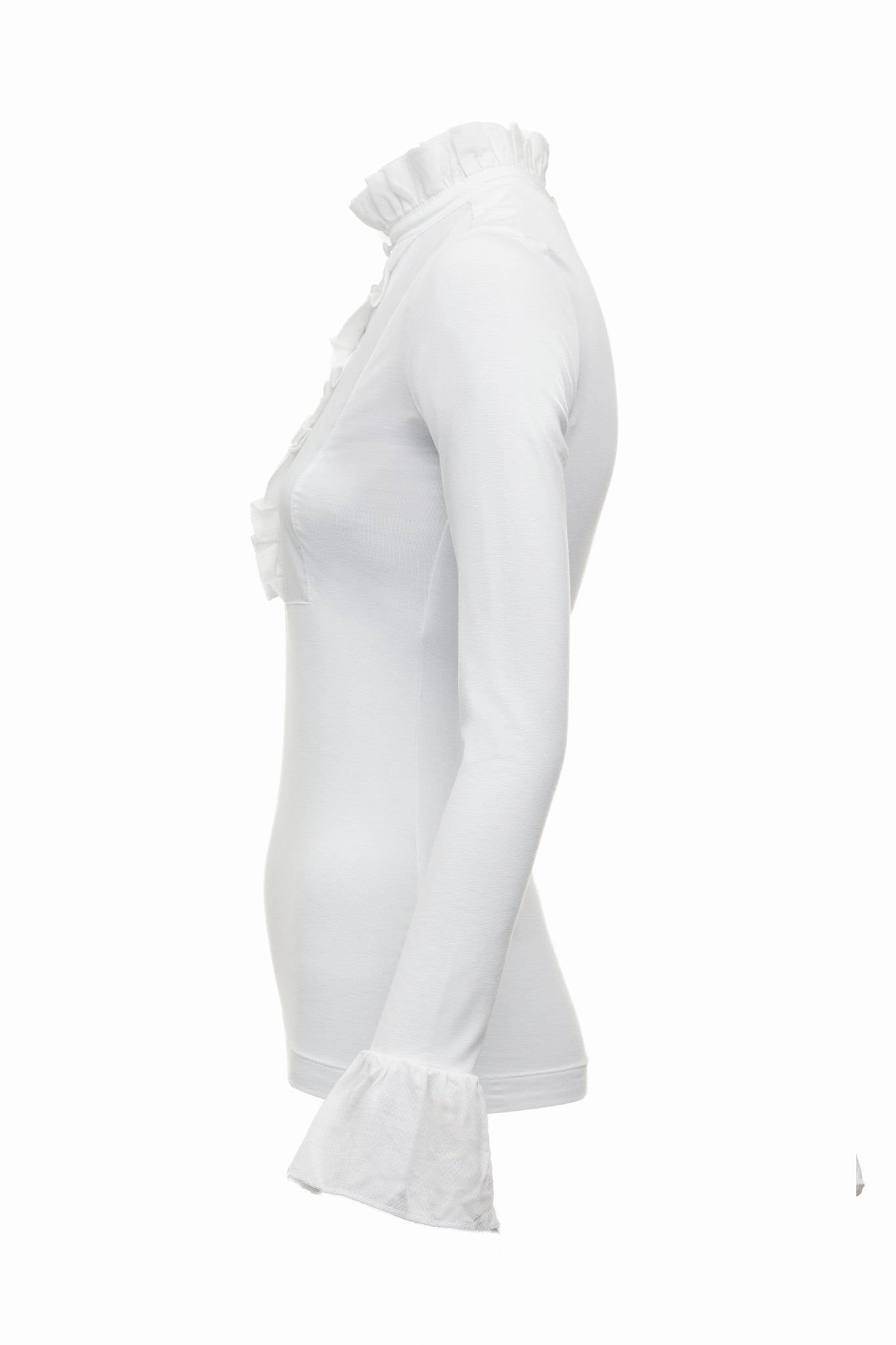 side image of a neatly fitted white long sleeve top with ruffled neckline and cuffs with frilly chest detail