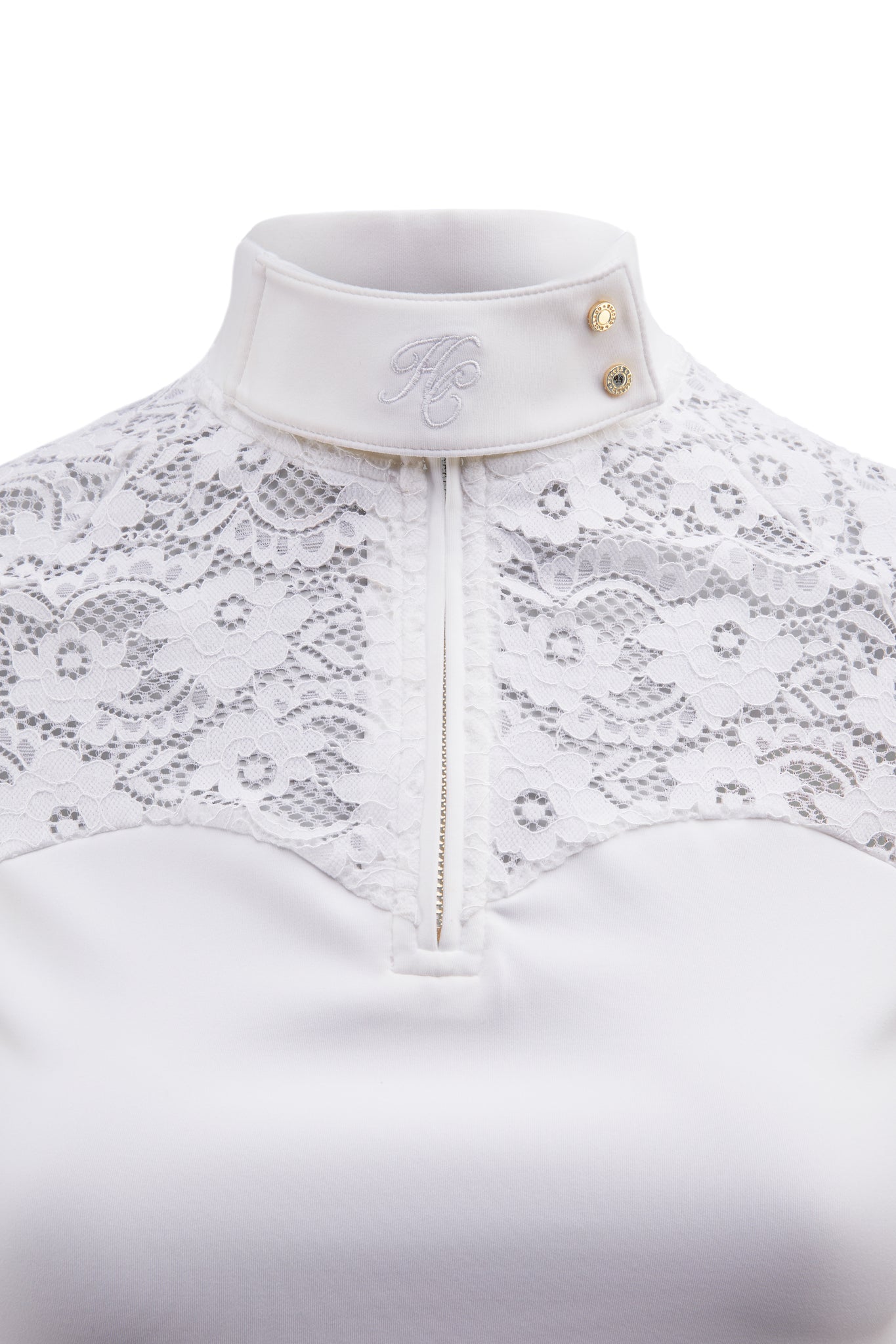 embroidery detail on front of turtle neck on white turtle neck short sleeve base layer with lace across shoulders and a sweetheart neckline 